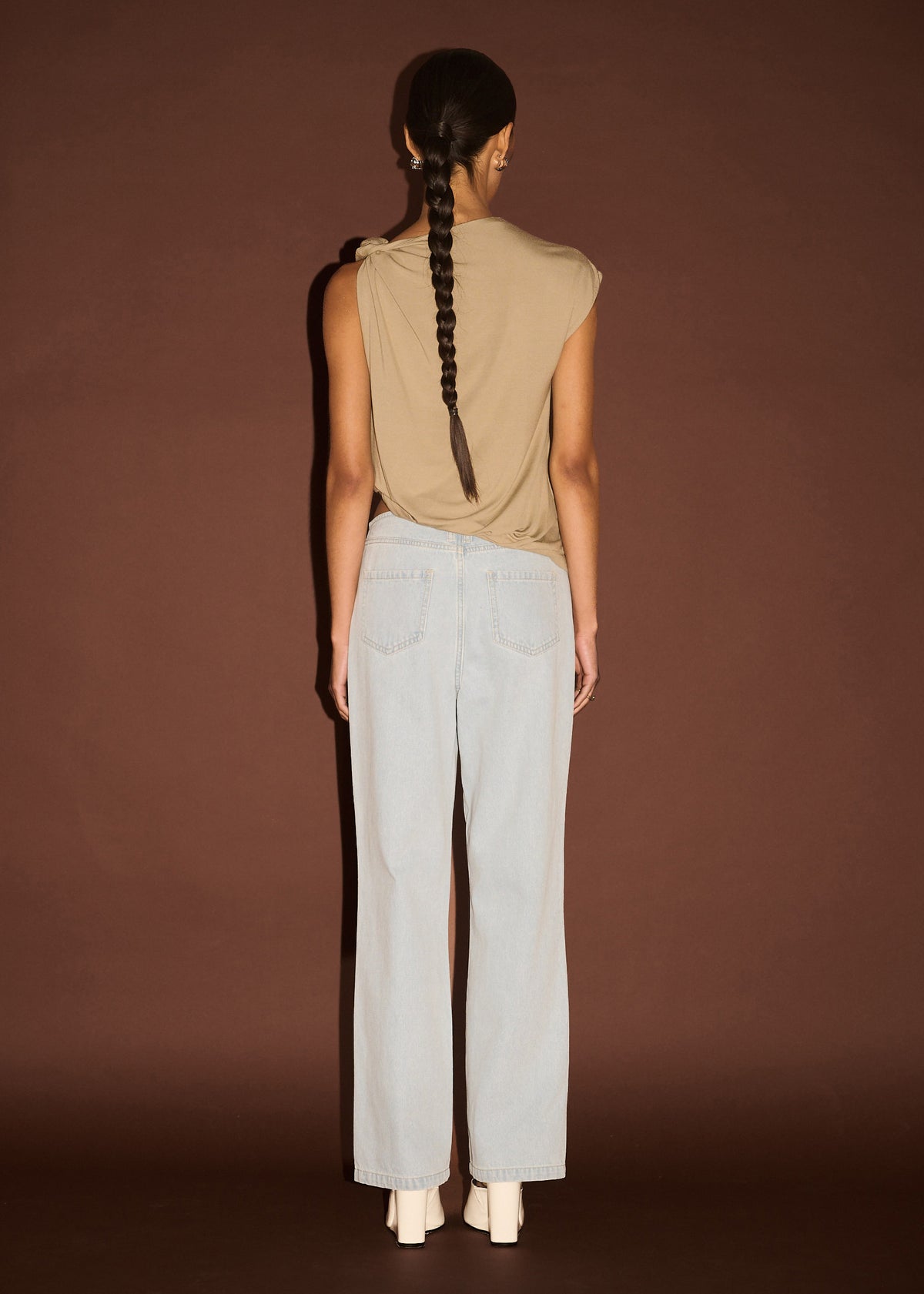 Back view of the Light Wash Straight Leg Denim Jeans with a high-rise waist and a straight leg silhouette.