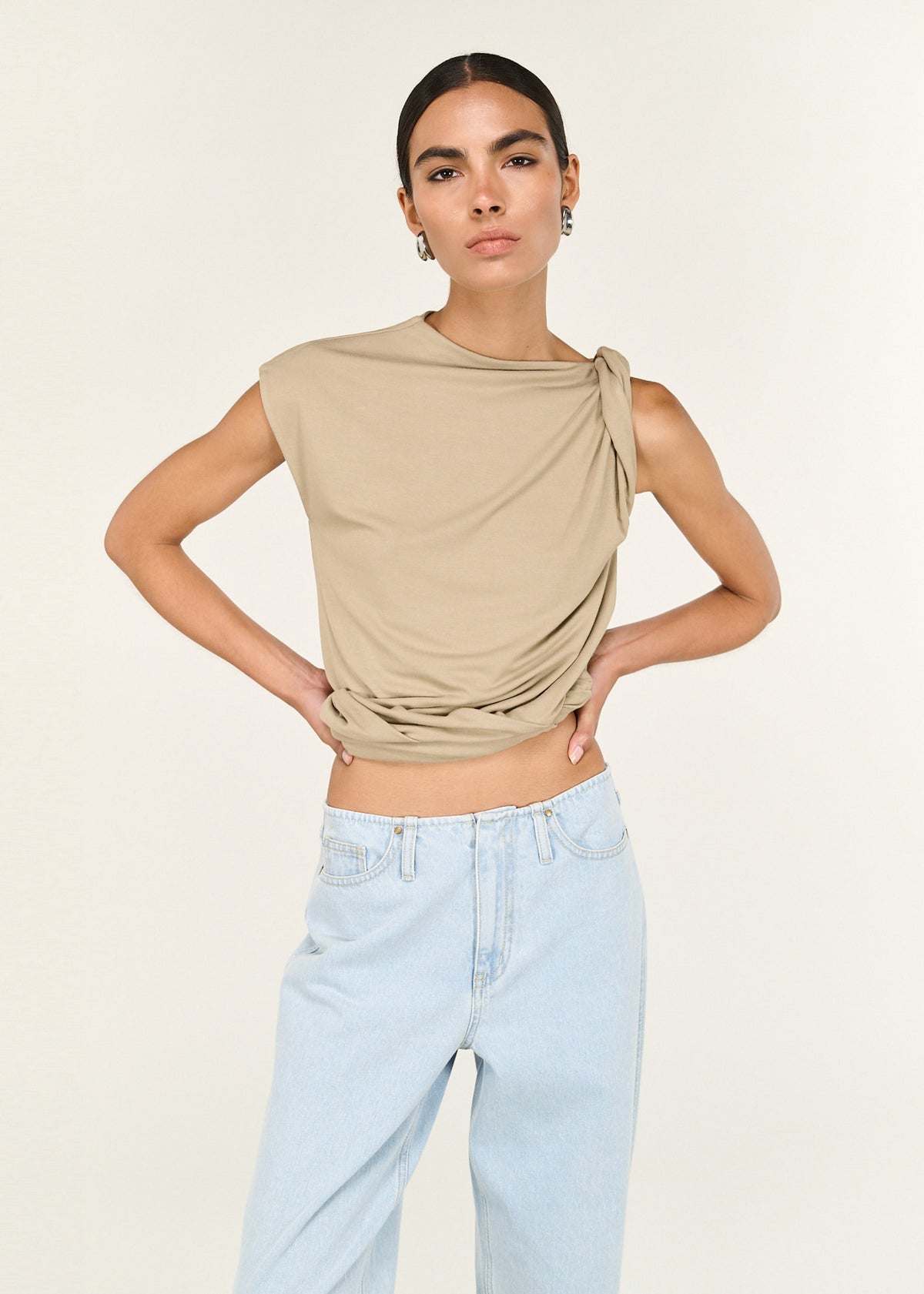 Close-up of the Light Wash Straight Leg Denim Jeans, showing a high-rise waist and a straight leg silhouette.