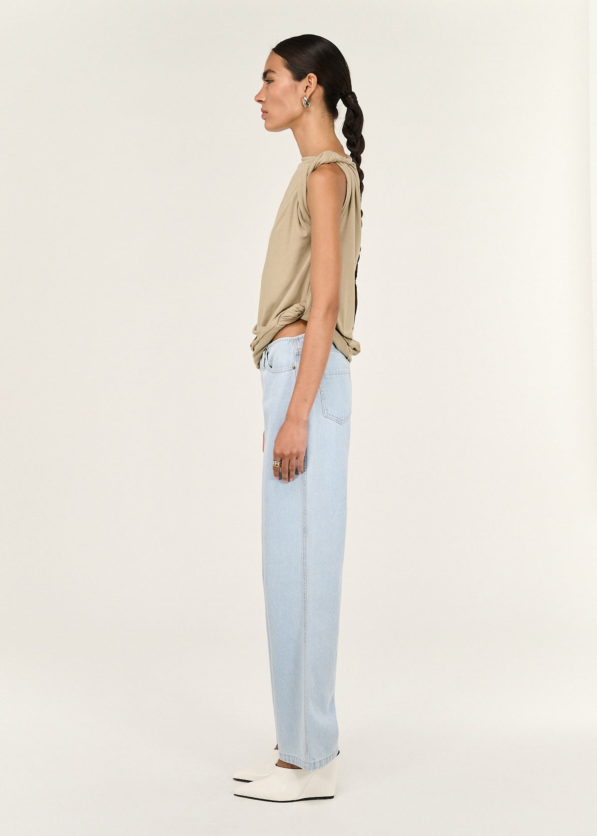 Side view of the Light Wash Straight Leg Denim Jeans, showing a high-rise waist and a straight leg silhouette.