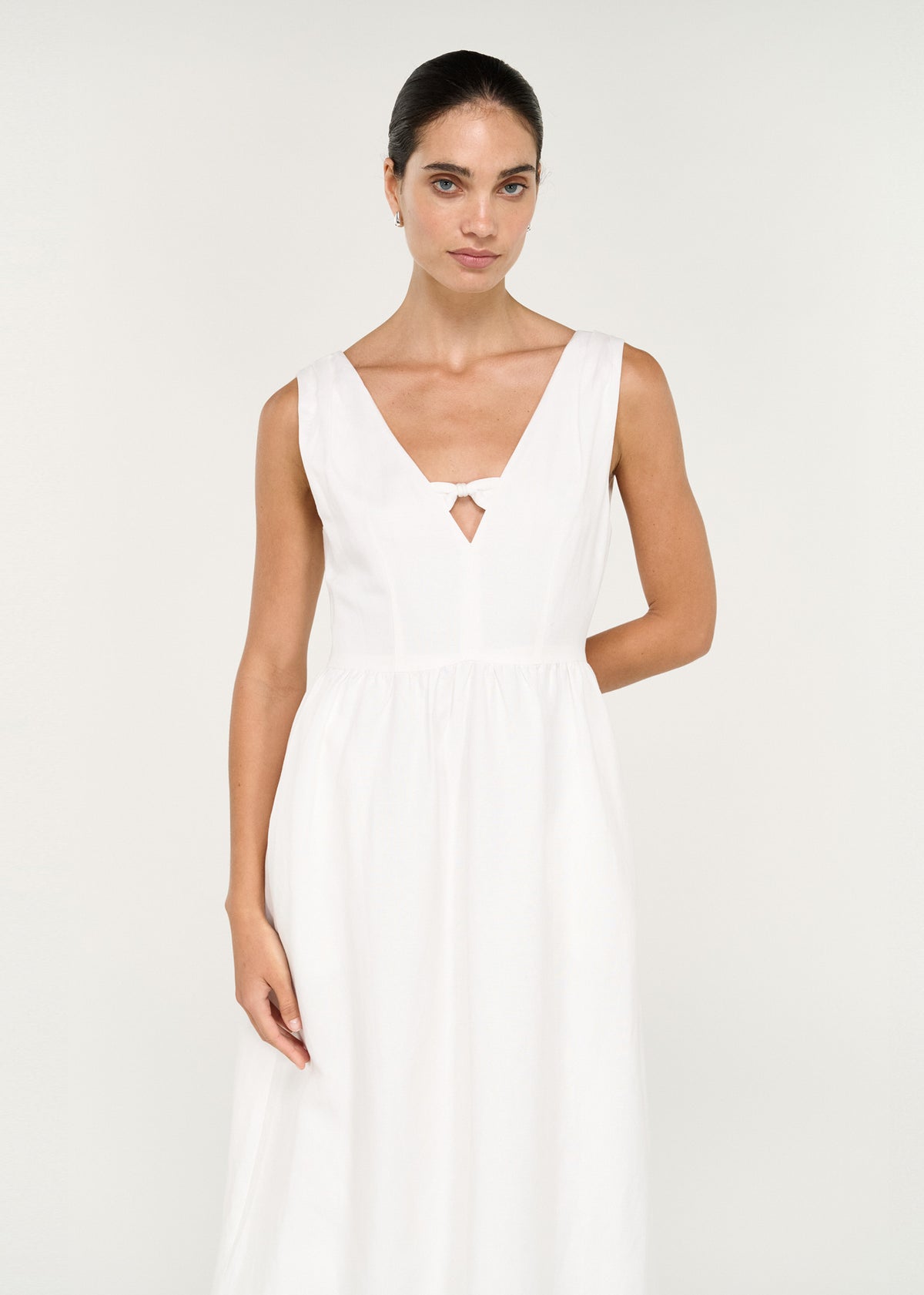 Linen Blend Keyhole Midi Dress in White worn by model, featuring a V-neckline and gathered skirt.