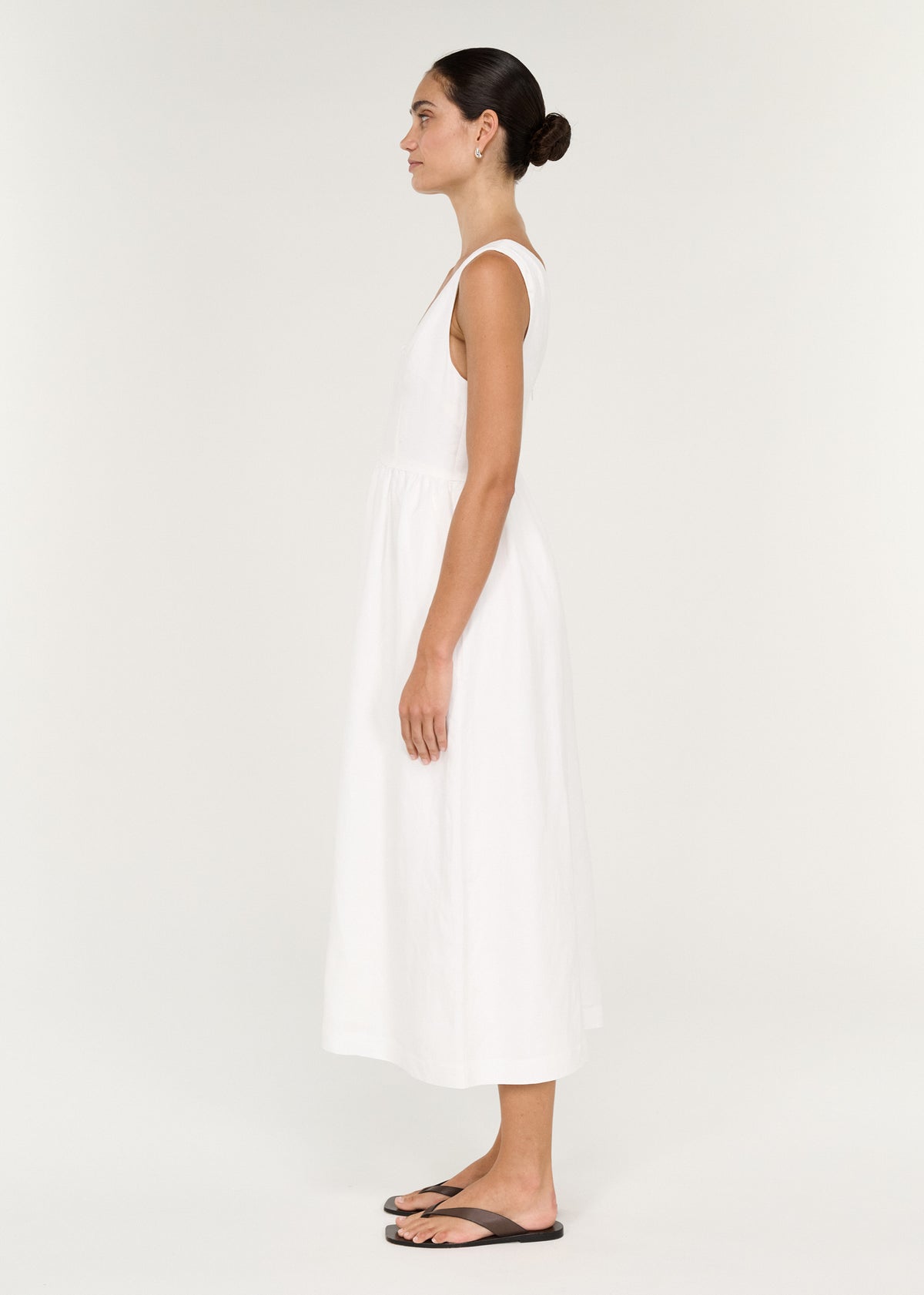 Linen Blend Keyhole Midi Dress in White shown from the side with a gathered skirt and sleeveless design.