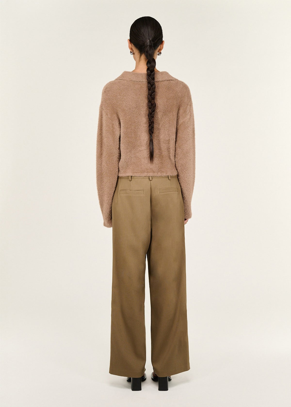 Back view of the Mocha Fluffy Knit Polo Jumper with a button placket and a relaxed fit silhouette.