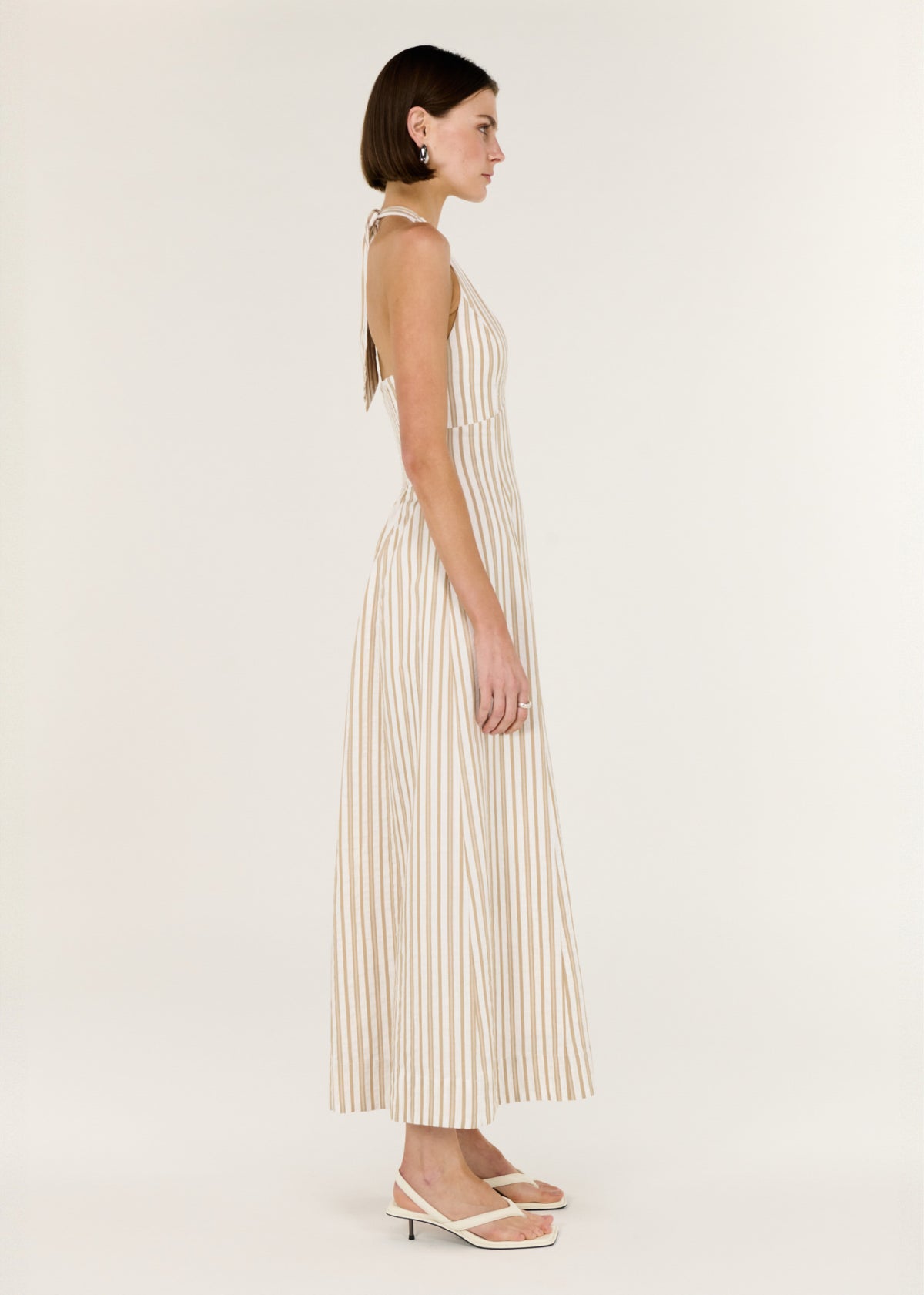 Side view of the Natural Cotton Blend Stripe V-Neck Halter Midi Dress, showing a shirred back panel.
