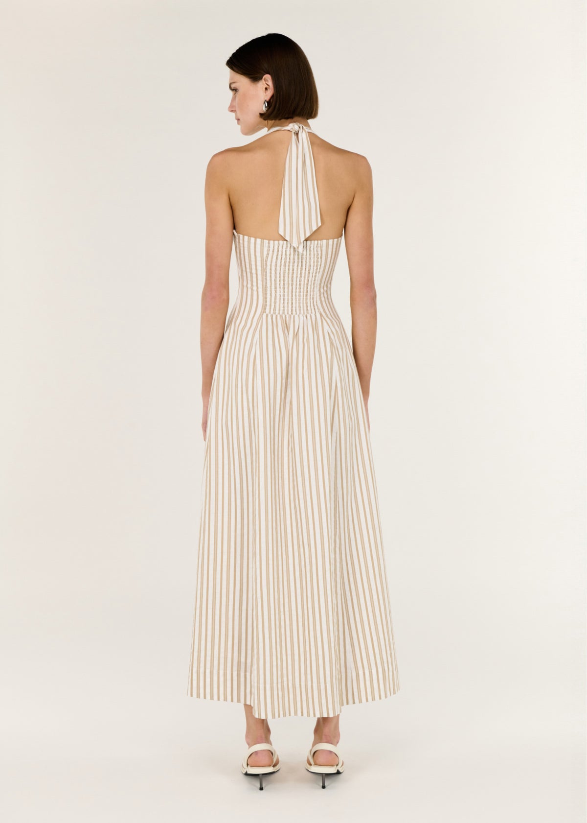 Back view of the Natural Cotton Blend Stripe V-Neck Halter Midi Dress with a halter neckline with tie back and an open back design.