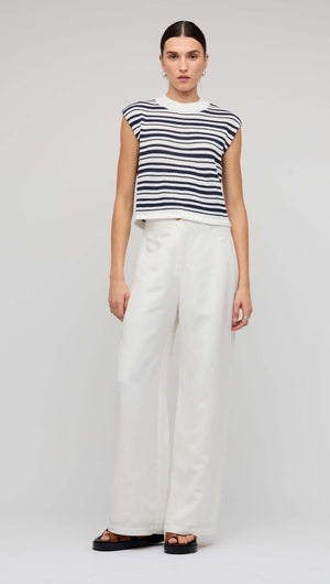 Navy & White Stripe Knit Tank Top styled with white wide-leg pants, showcasing a relaxed fit and coastal vibe.