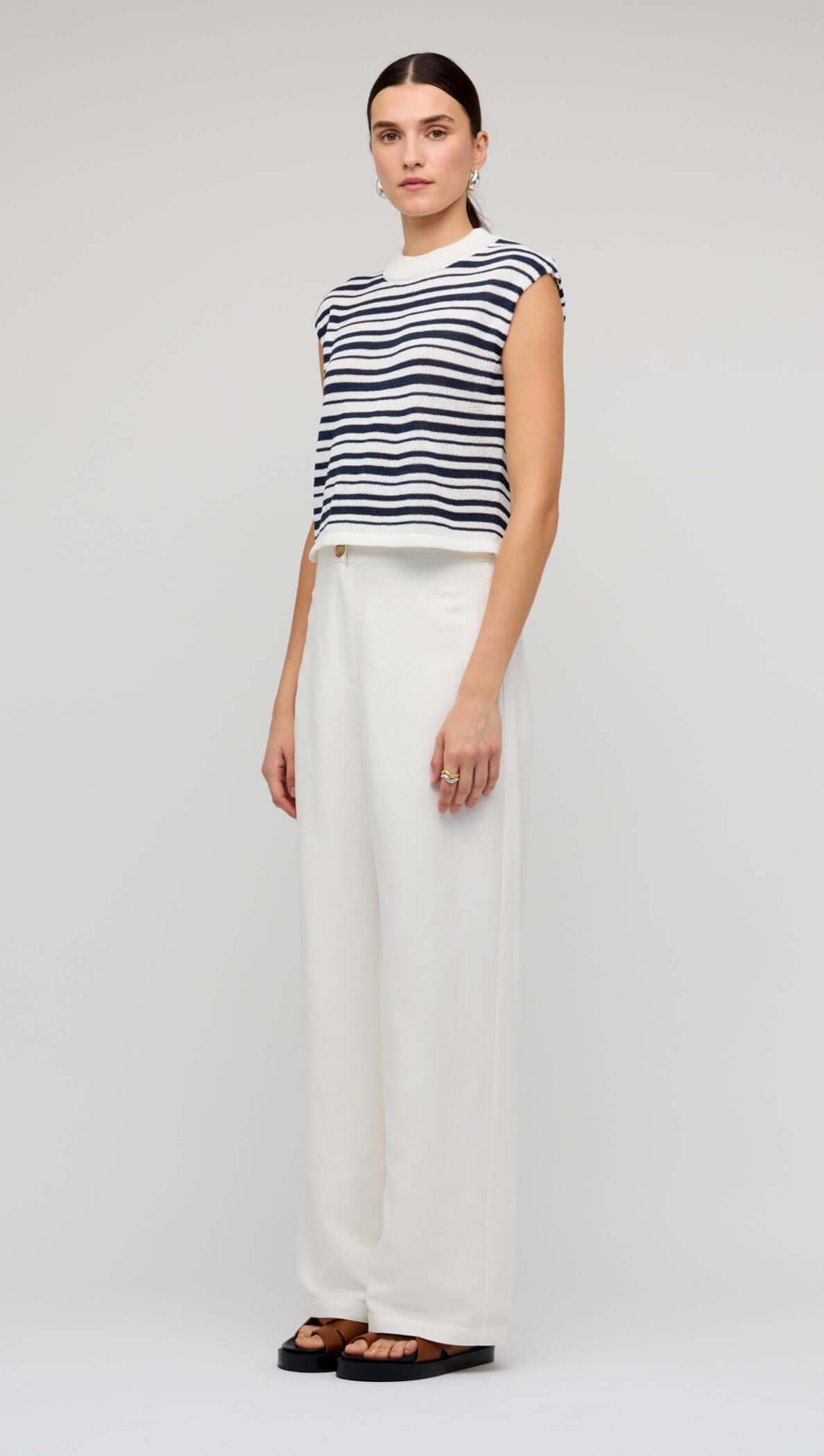 Navy & White Stripe Knit Tank Top styled with white wide-leg pants for a fresh coastal look.