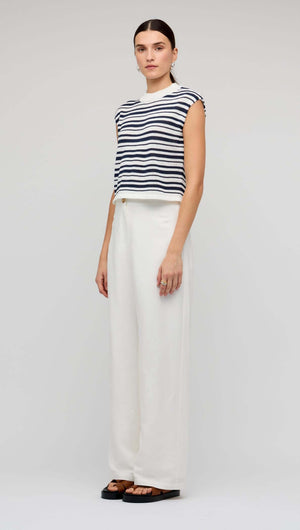 Navy & White Stripe Knit Tank Top styled with white wide-leg pants for a fresh coastal look.