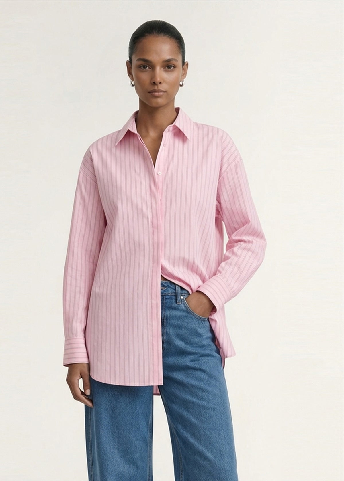 Close-up of the Oversized Cotton Shirt with Back Button Detail, showing a classic collar neckline and a button-through front.