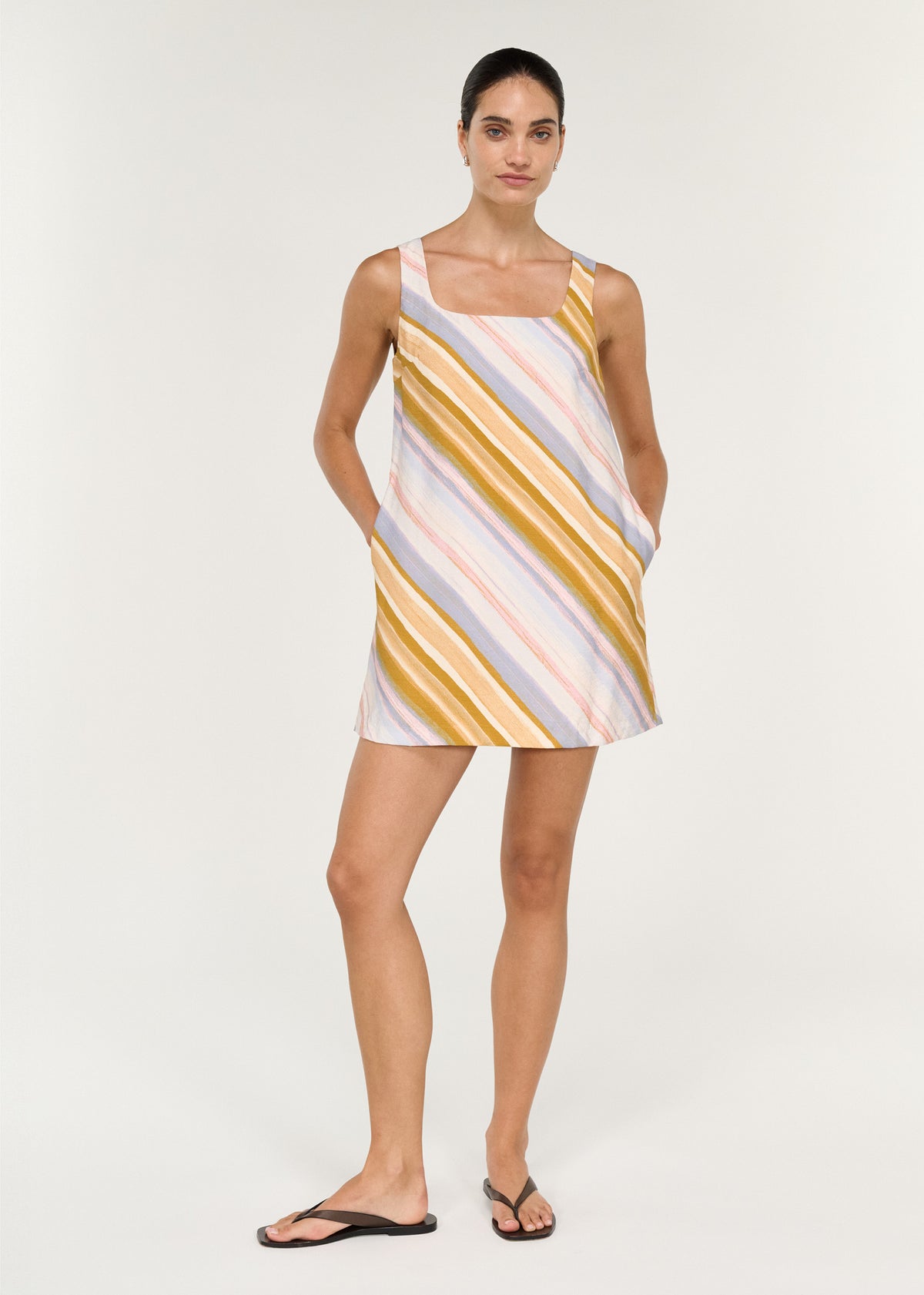 Model wearing Pastel Stripe Square Neck Mini Dress, showing an a-line silhouette and a square neckline.