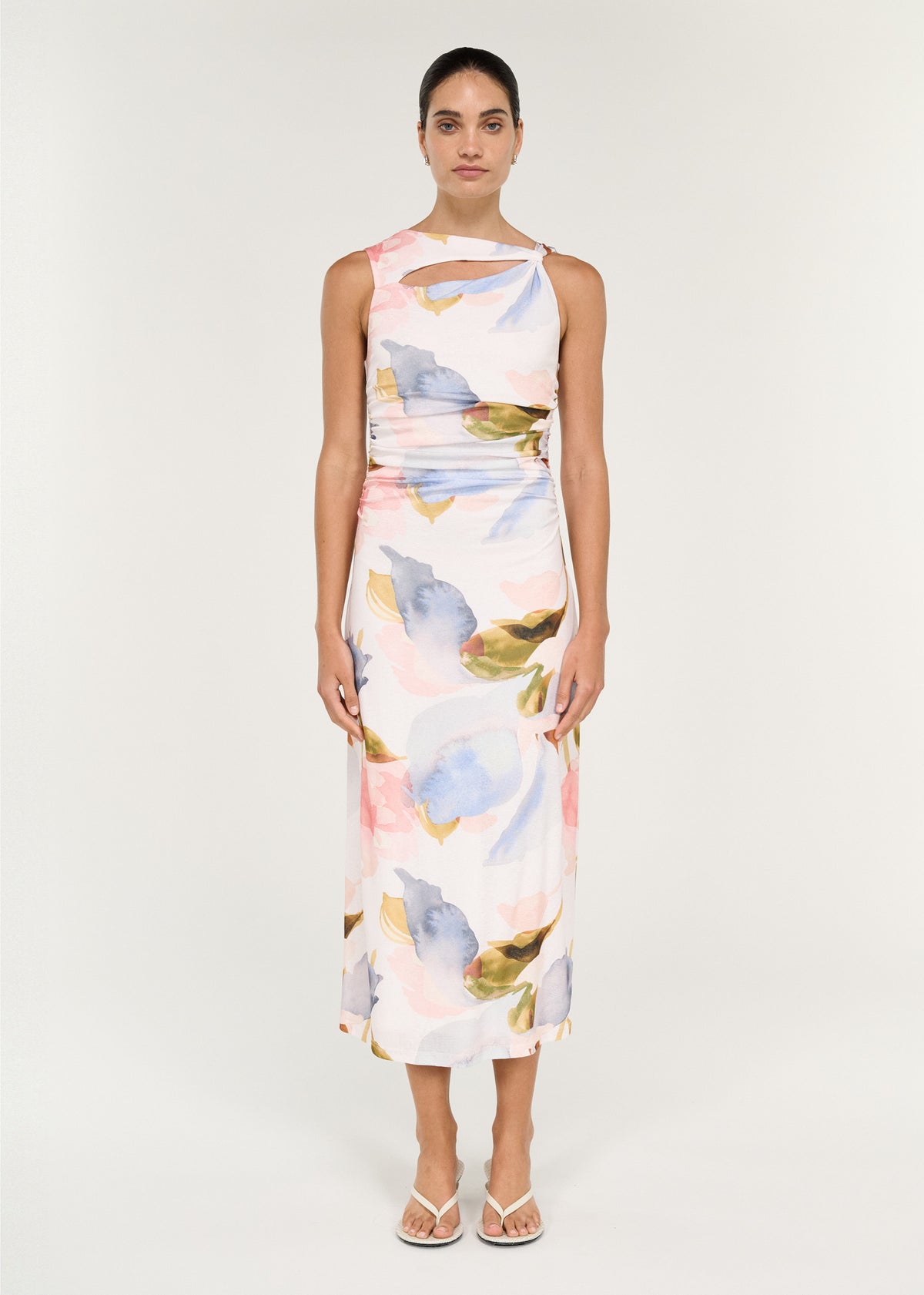 Model wearing Pastel Watercolour Sleeveless Mesh Midi Dress with a lightweight mesh fabrication and a painterly floral print.