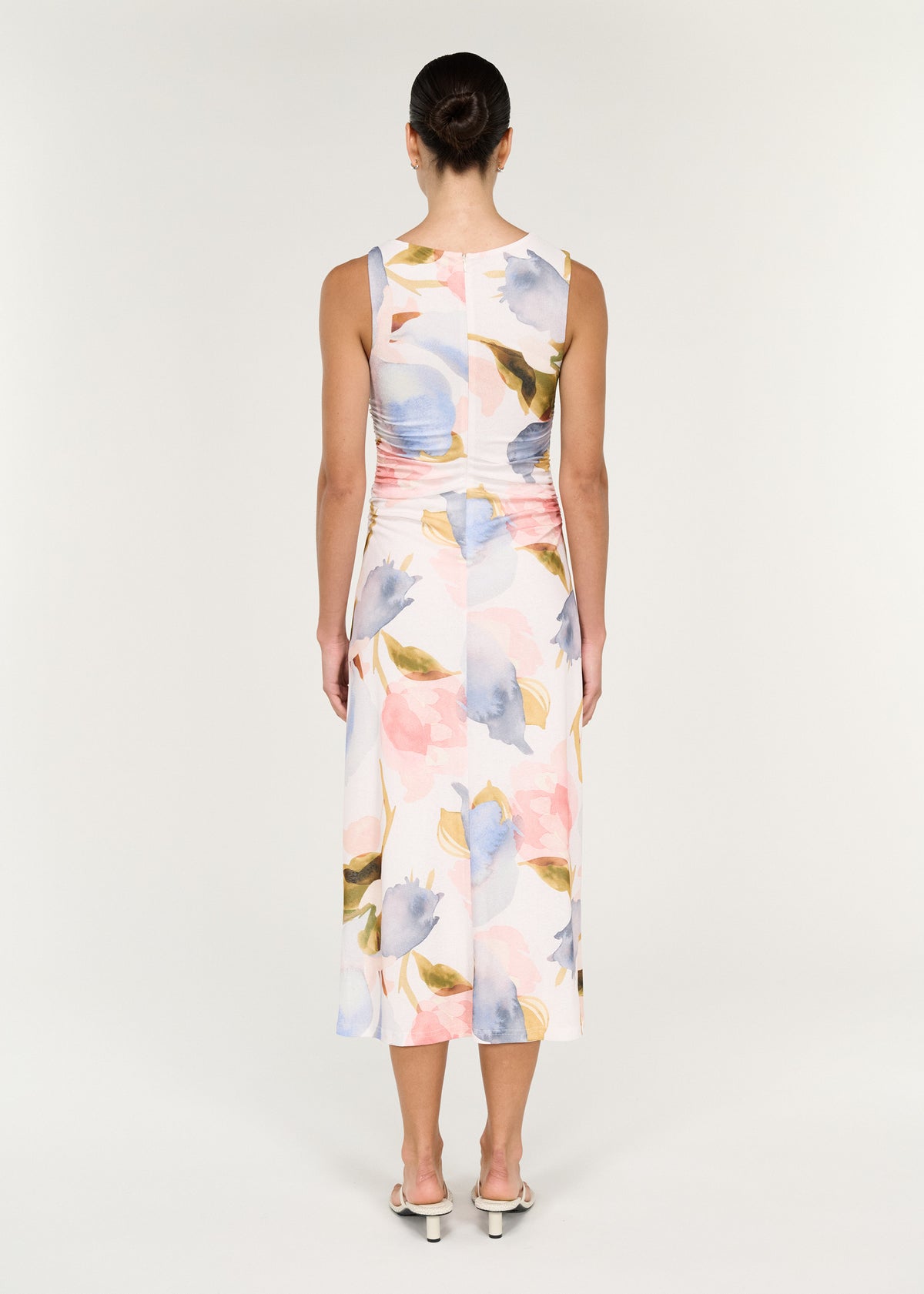 Back view of the Pastel Watercolour Sleeveless Mesh Midi Dress with a lightweight mesh fabrication and a painterly floral print.