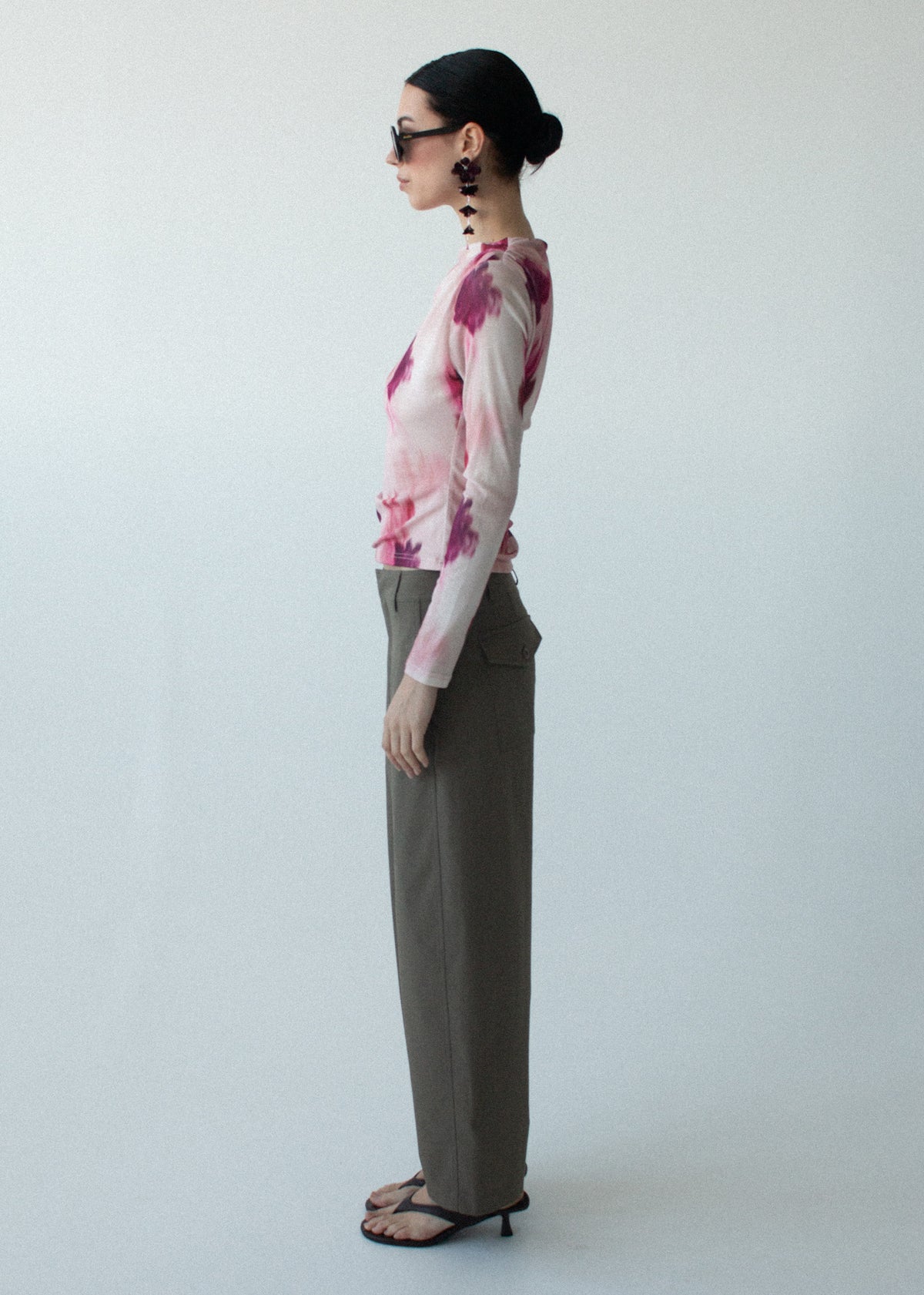 Side view of the Pink Floral Mesh Long Sleeve Top, showing a soft stretch feel and a lightweight finish.
