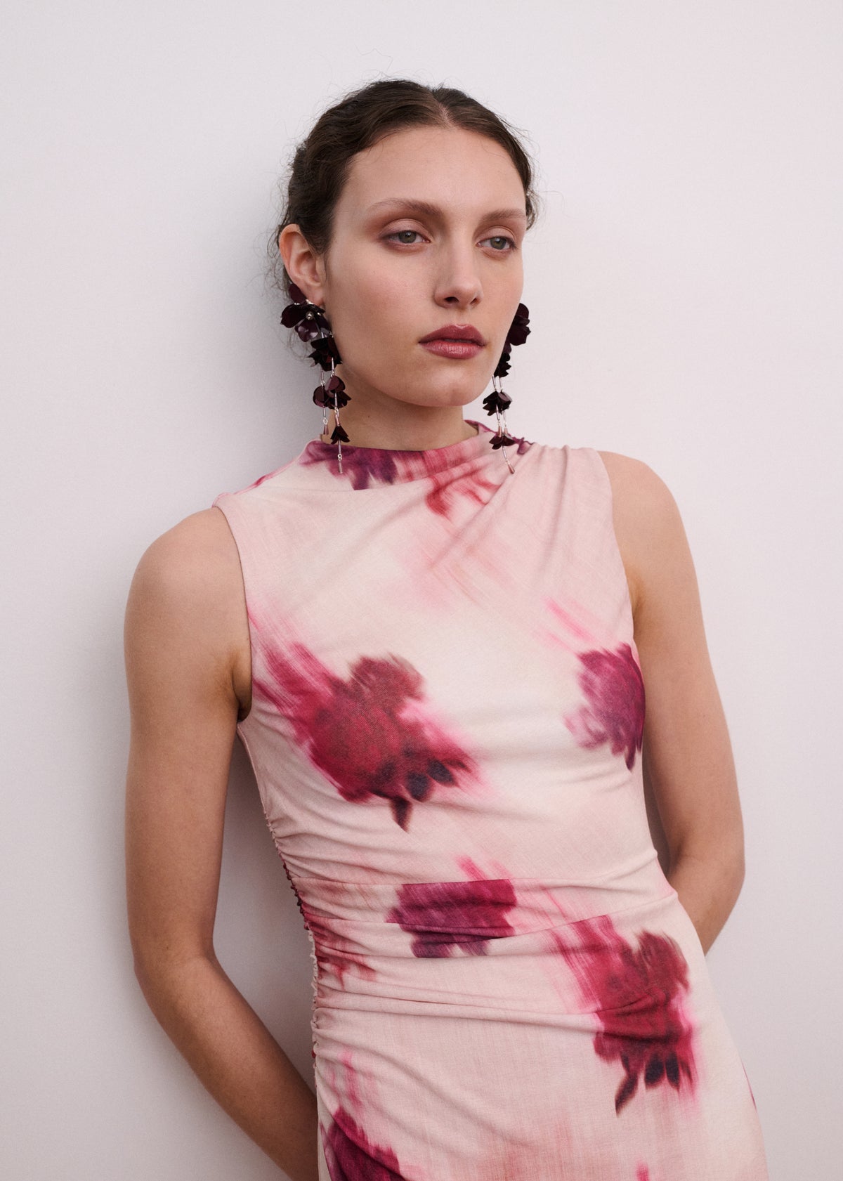 Close-up of the Pink Floral Sleeveless Mesh Midi Dress, showing a high neckline and a sleeveless cut.