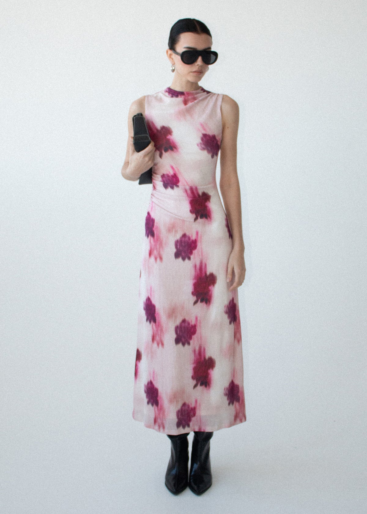 Model wearing Pink Floral Sleeveless Mesh Midi Dress with a midi length and a soft stretch feel.