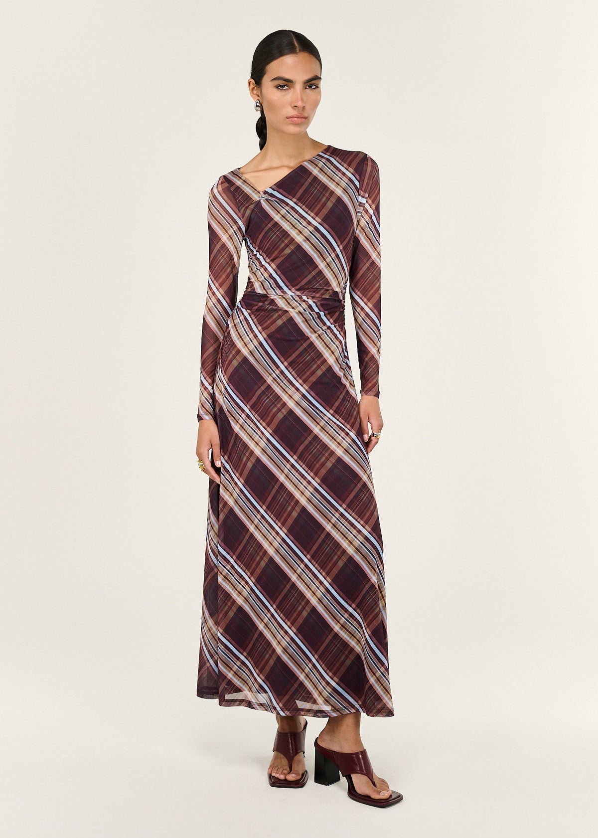 Model wearing Plaid Mesh Long Sleeve Midi Dress, showing a soft stretch and drape.