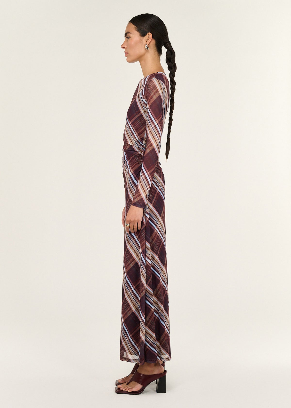 Side view of the Plaid Mesh Long Sleeve Midi Dress, showing an all-over diagonal plaid print.