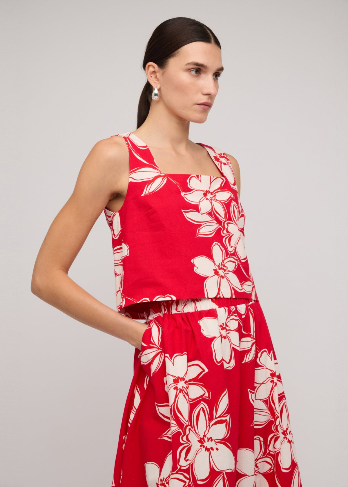 Close-up detail of the Red and White Cotton Floral A-Line Maxi Skirt, showing skirt waistband.
