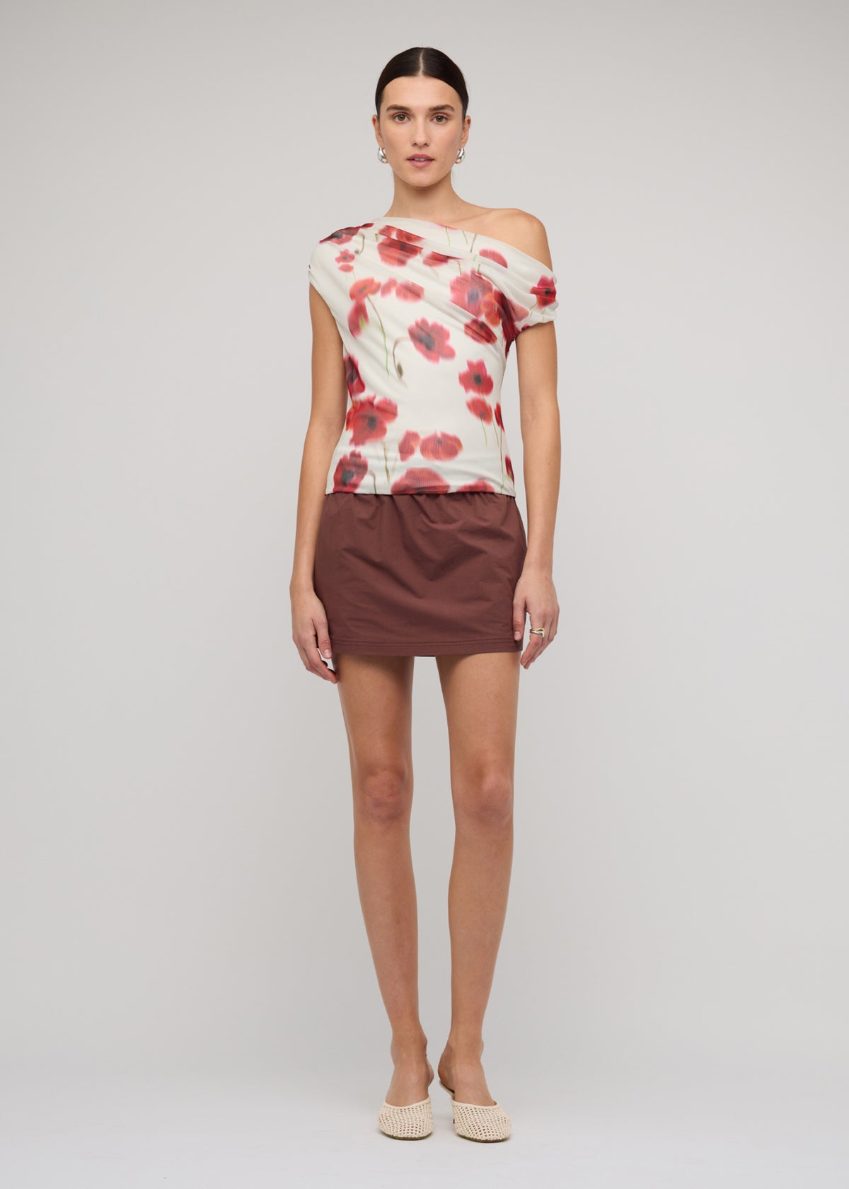 Model wearing Red and White Poppy Print Off-Shoulder Mesh Top with a fully lined and a fitted silhouette.