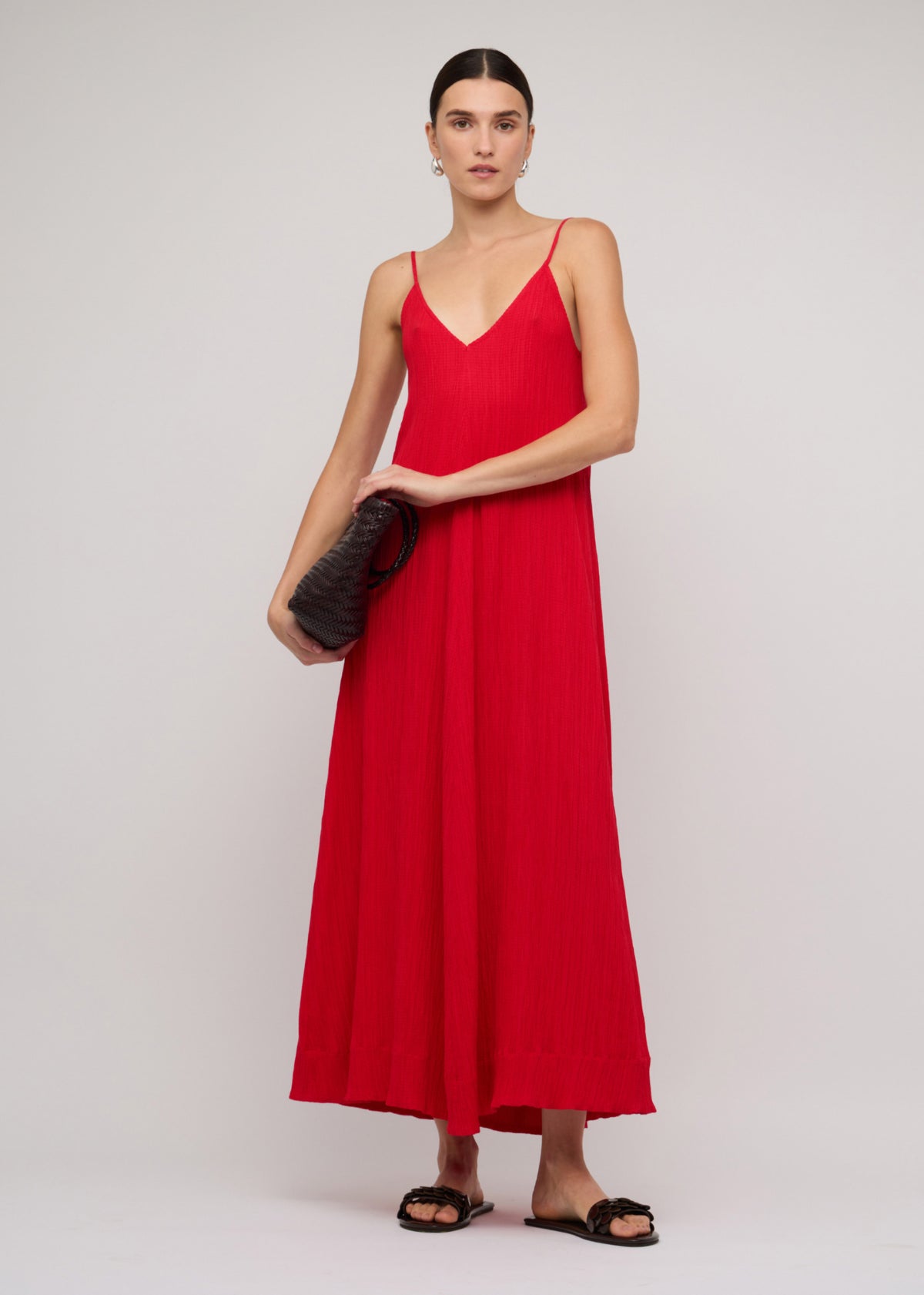 Model wearing Red Crepe V-Neck Floaty Maxi Dress with slim adjustable straps (front full body).