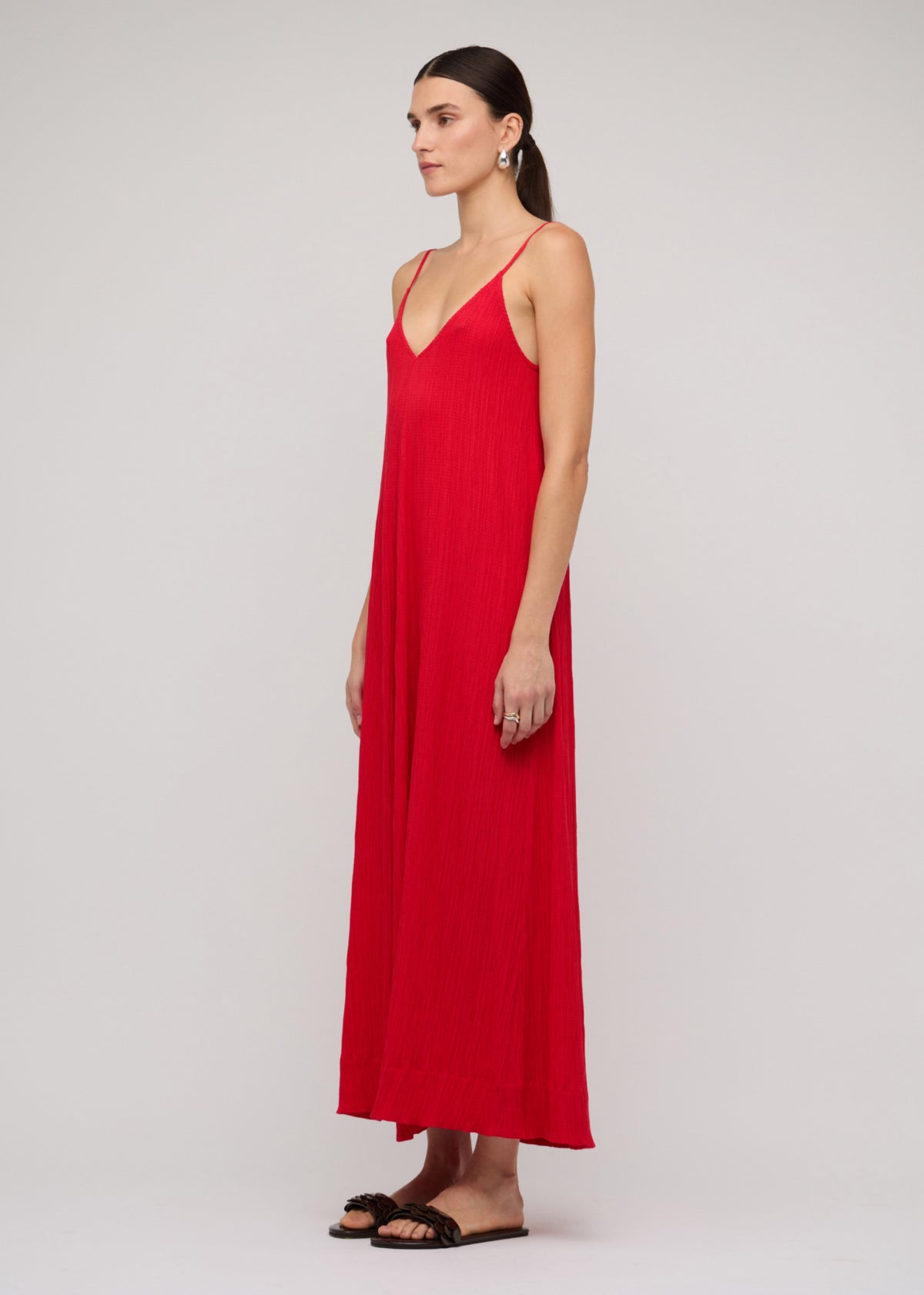 Side view of the Red Crepe V-Neck Floaty Maxi Dress, showing slim adjustable straps.
