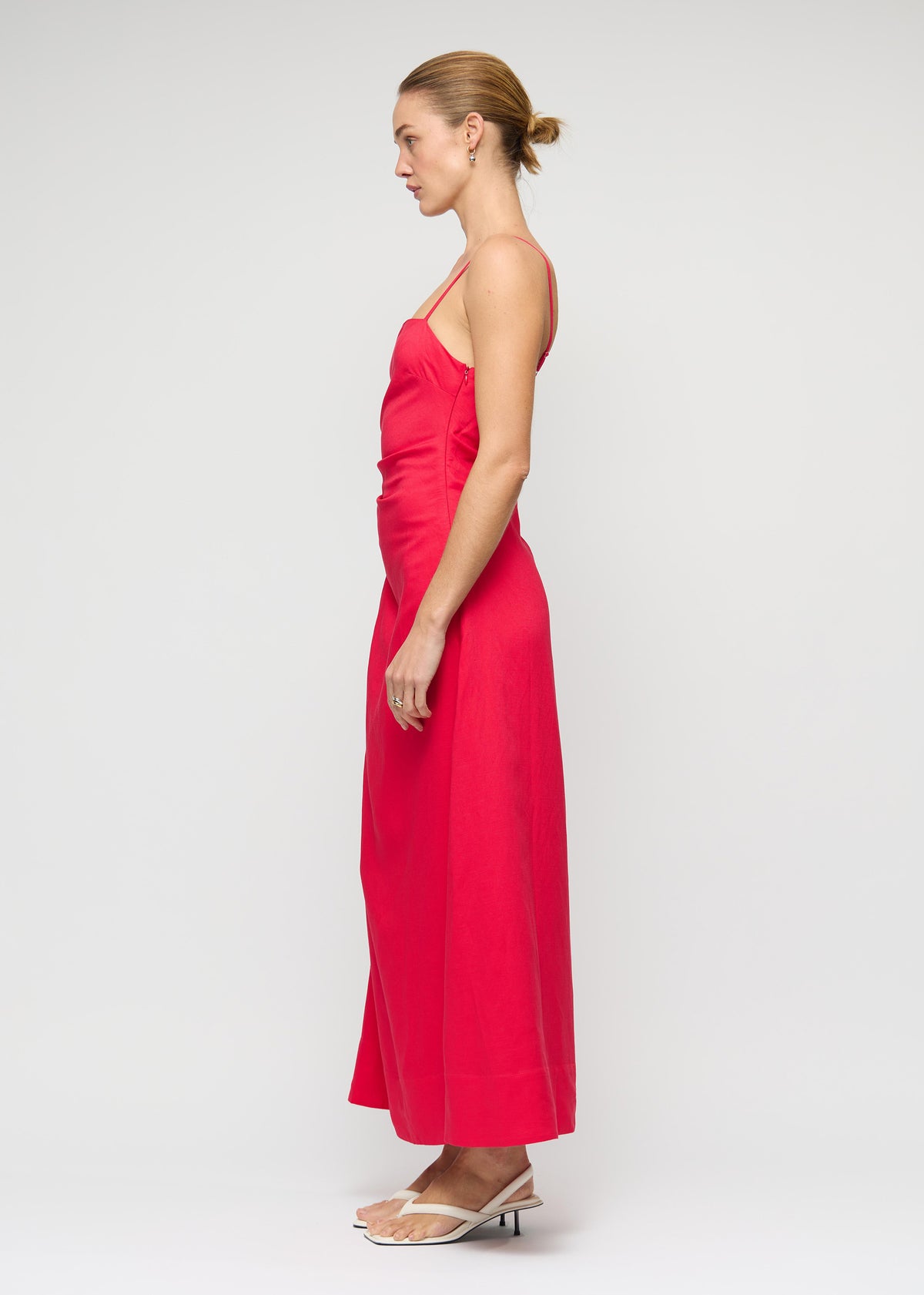 Side view of the Red Linen Blend Cut-Out Maxi Dress, showing a maxi length and a fully lined.