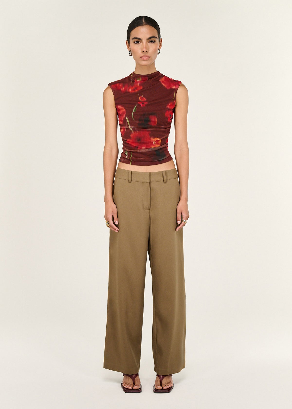 Model wearing Red Poppy Print Mesh Tank, showing a slight cropped Length and a lightweight feel.