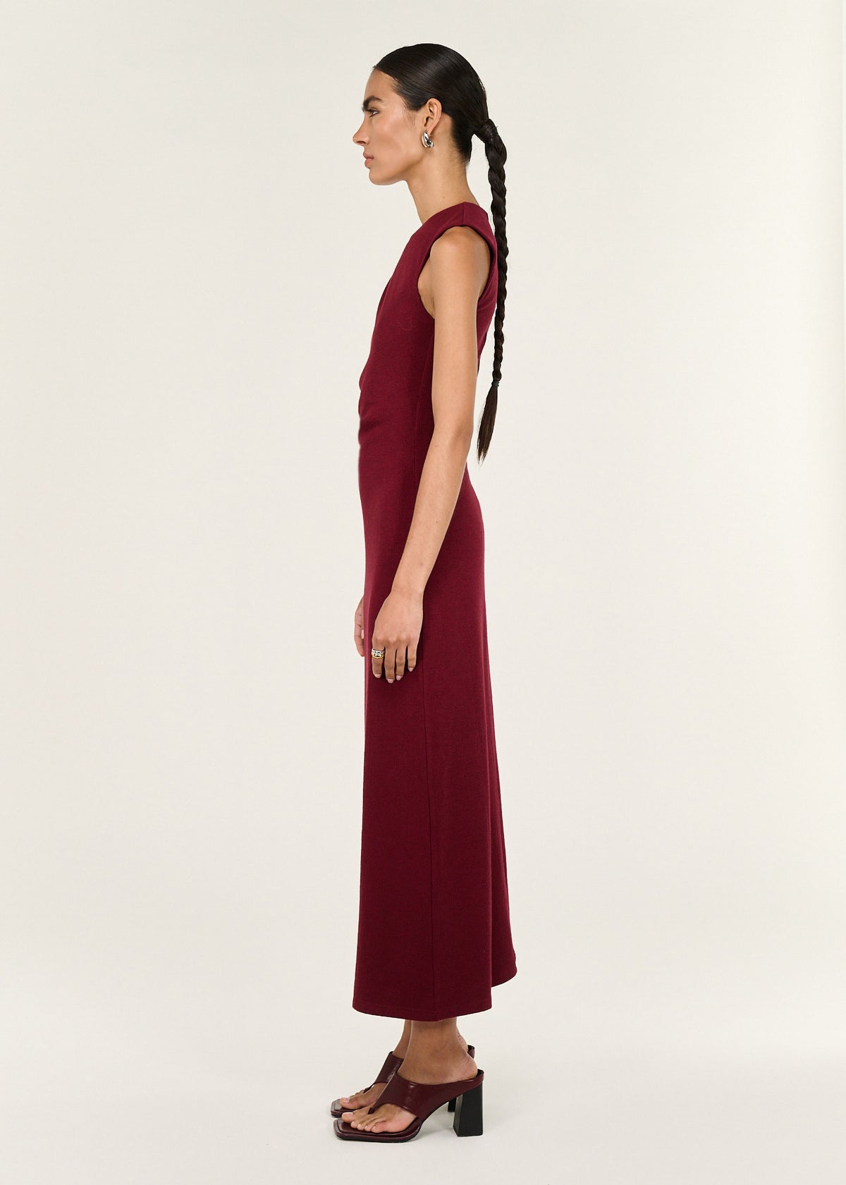 Side view of the Red Stretch Jersey Midi Dress, showing a soft stretch fabrication and a crew neckline.