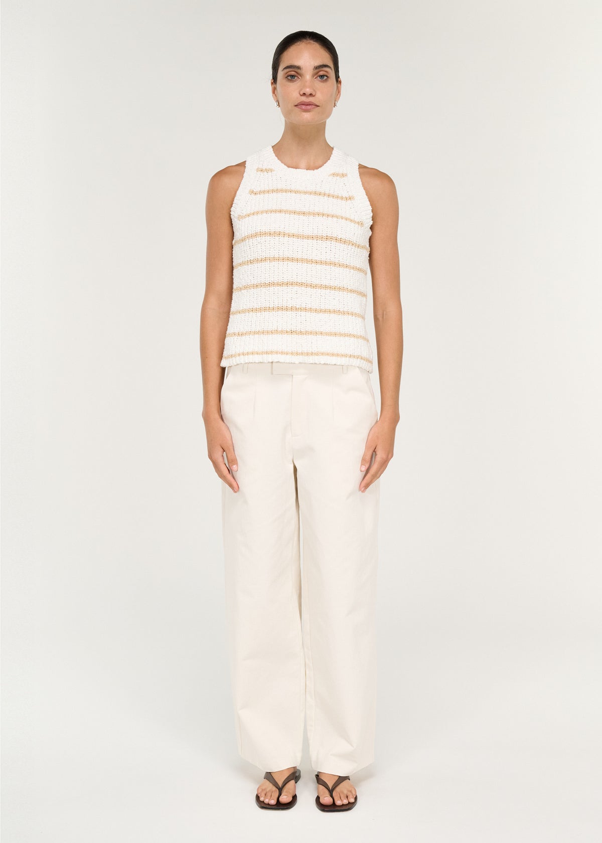 Model wearing Relaxed Cotton Wide Leg Pant in Cream with a structured woven fabrication and a tailored silhouette.