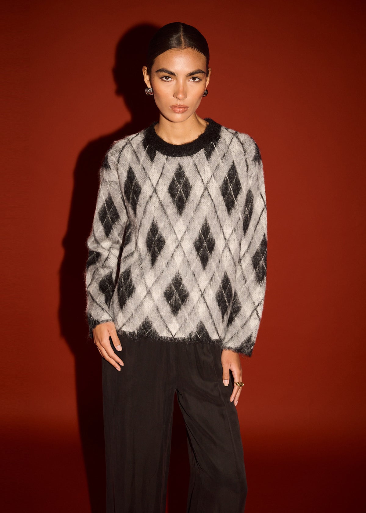 Close-up of the Relaxed Fit Argyle Brushed Jumper, showing a crew neckline and a soft brushed knit fabrication.