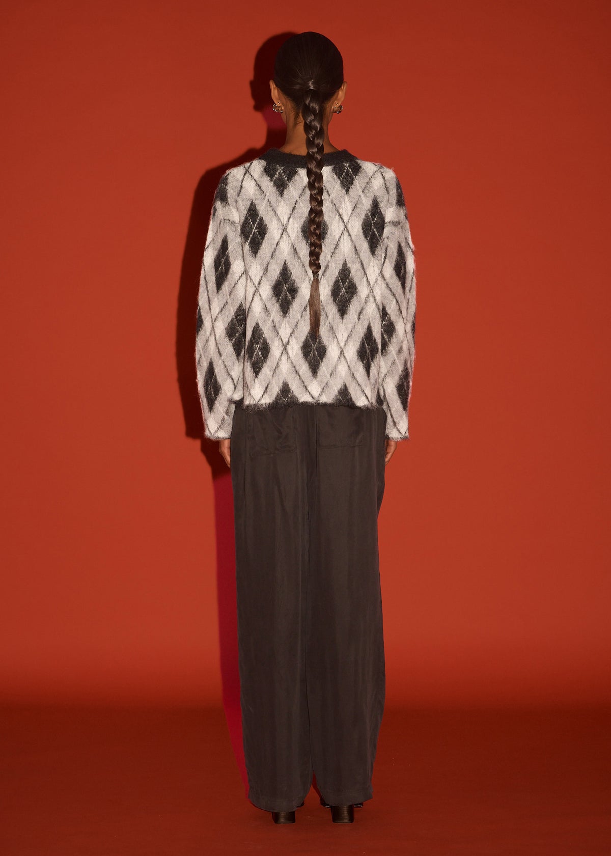 Back view of the Relaxed Fit Argyle Brushed Jumper with a soft brushed knit fabrication and an argyle pattern design.