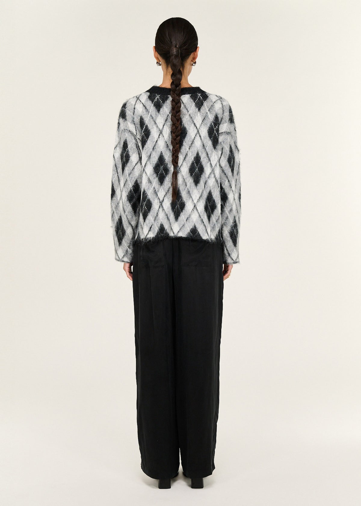 Back view of the Relaxed Fit Argyle Brushed Jumper, showing a soft brushed knit fabrication and an argyle pattern design.