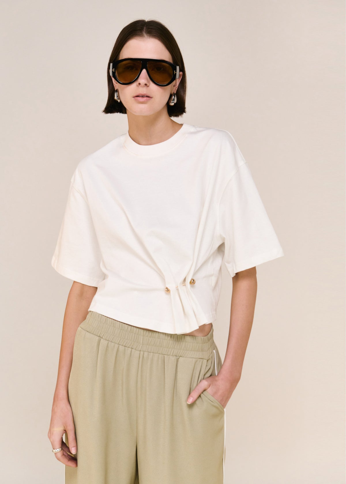 Close-up of the Sage Relaxed Track Pant, showing a relaxed wide-leg silhouette and an elasticated waistband.