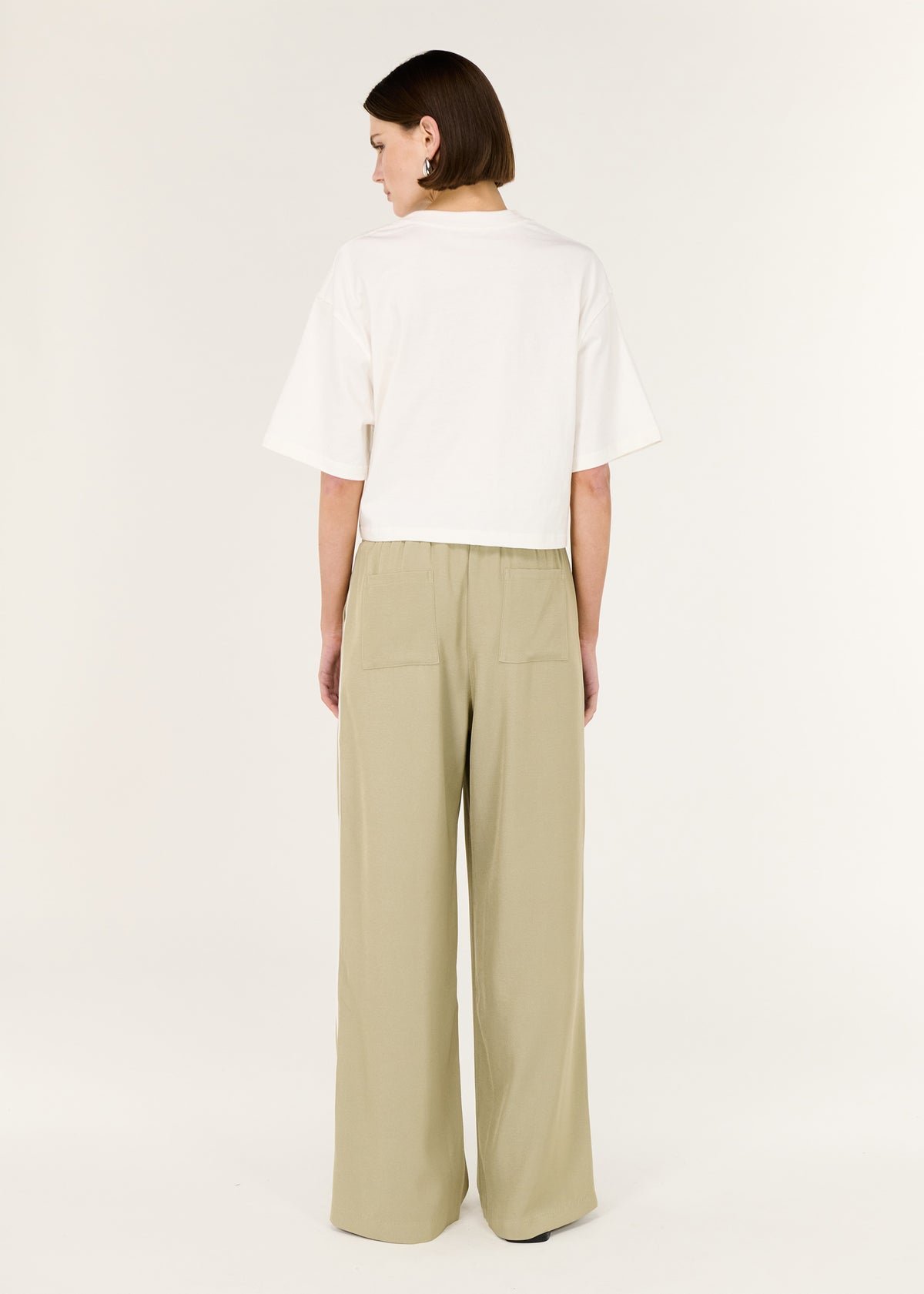 Back view of the Sage Relaxed Track Pant with a relaxed wide-leg silhouette and an elasticated waistband.