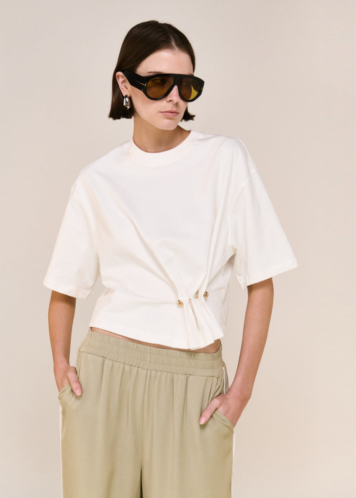 Close-up of Sage Relaxed Track Pant with a relaxed wide-leg silhouette and an elasticated waistband.