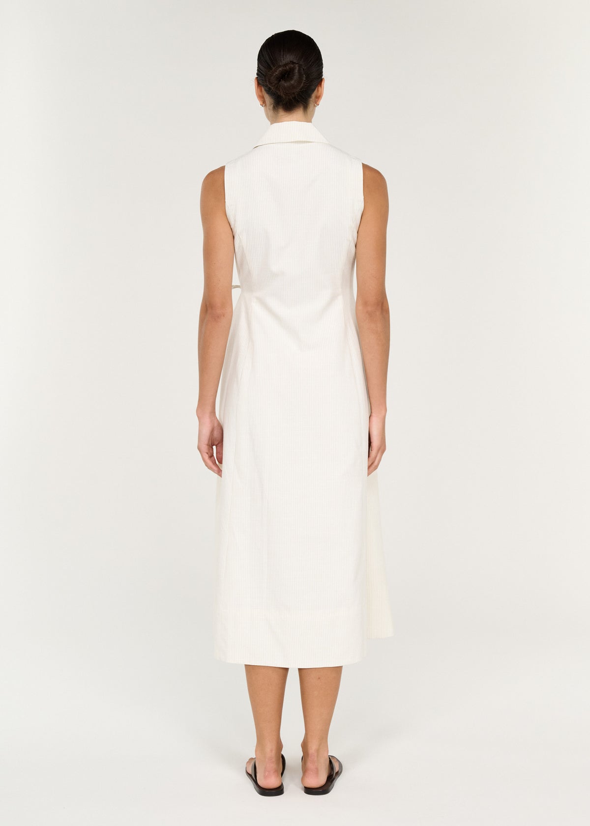 Back view of the Savina Wrap Midi Dress with a self-tie fastening at the waist and a wrap-front bodice with notched tailored collar.
