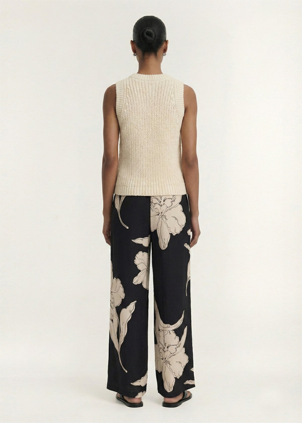 Back view of the Sketched Floral Drawstring Pant, showing an adjustable drawcord tie and a lightweight woven fabrication.
