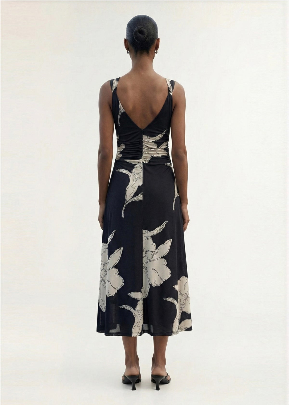 Back view of the Sketched Floral Mesh Midi Dress, showing a low back detail and a printed stretch mesh fabrication.