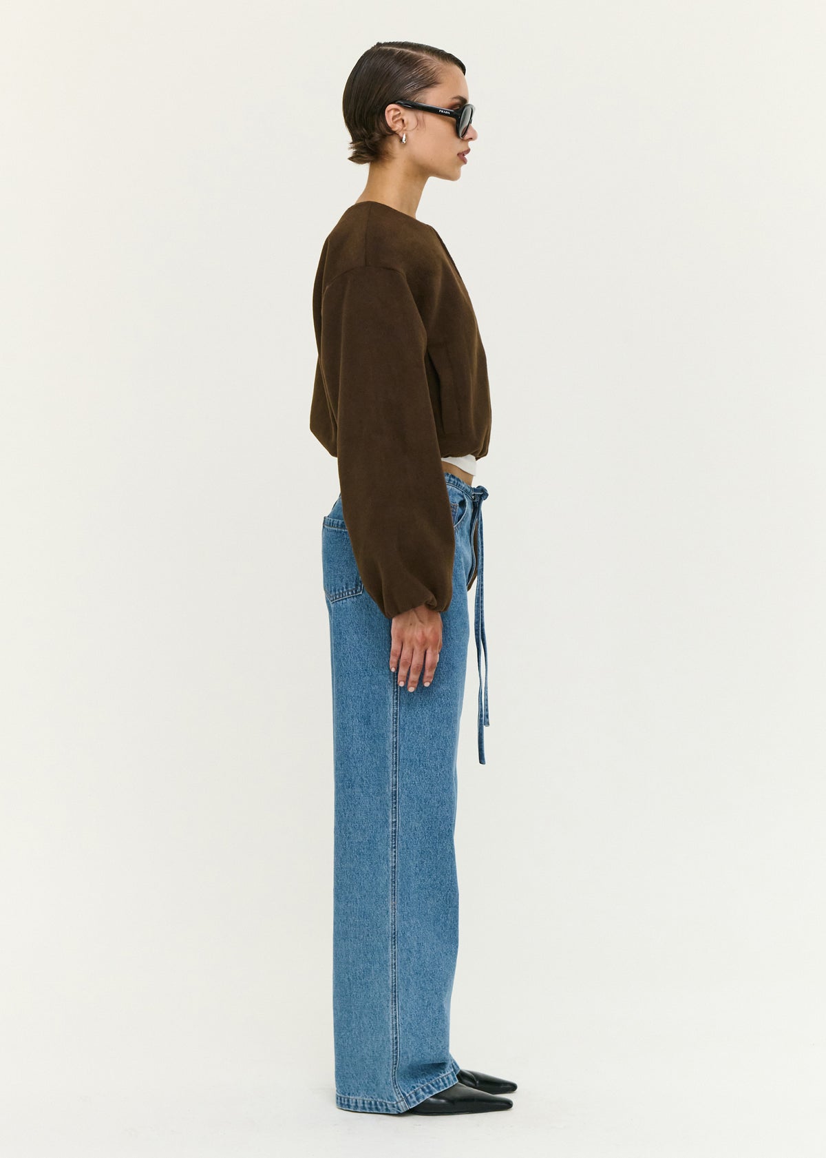 Side view of the Soft Brushed Cropped Bomber Jacket, showing a fully lined and a soft brushed fabrication.