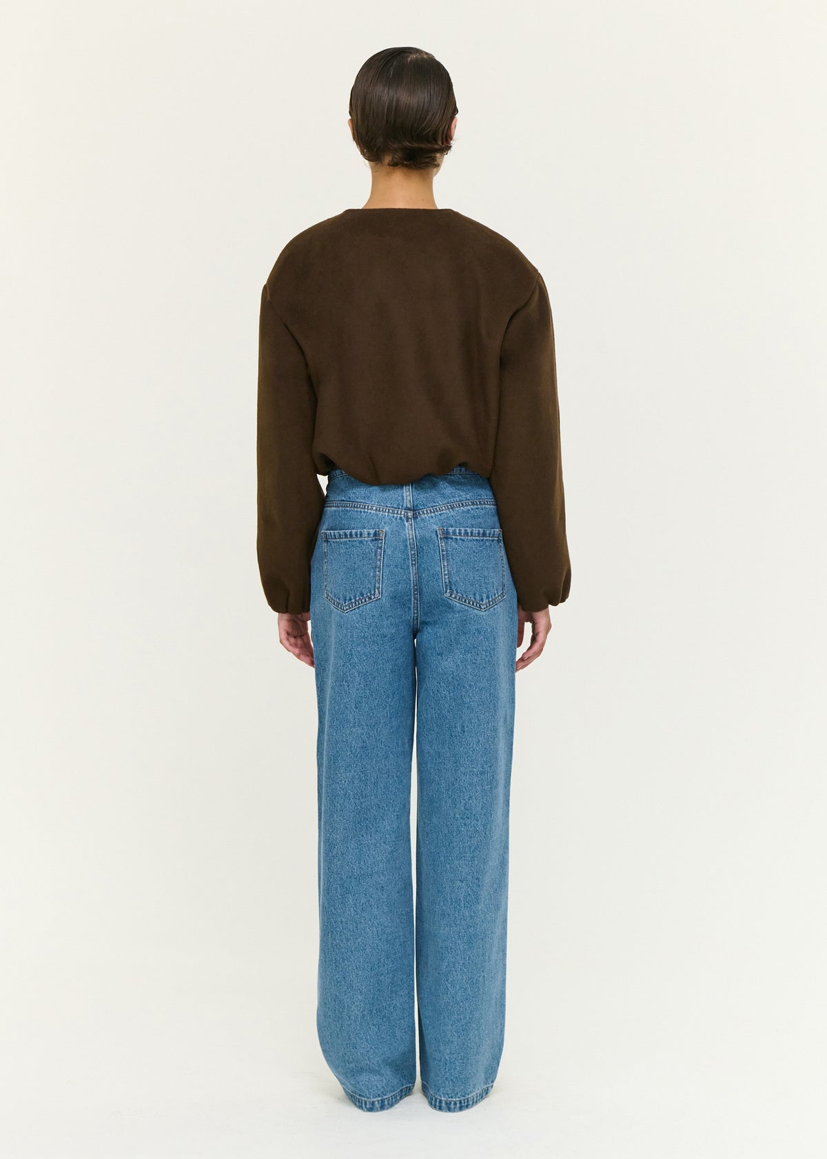 Back view of the Soft Brushed Cropped Bomber Jacket with a front zip closure and a soft brushed fabrication.