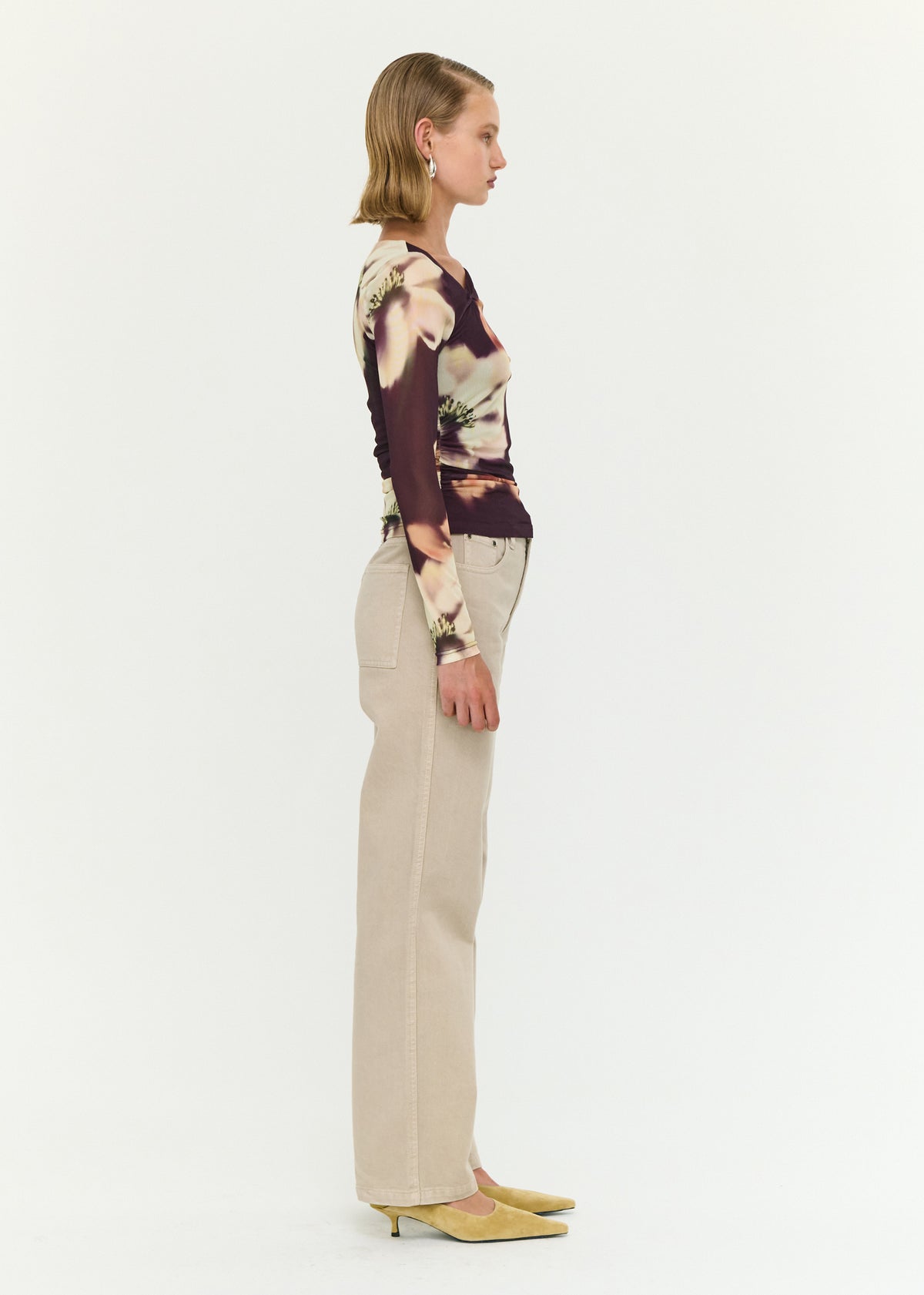 Side view of the Stone Wash Straight Leg Jeans, showing a full length and a neutral wash.