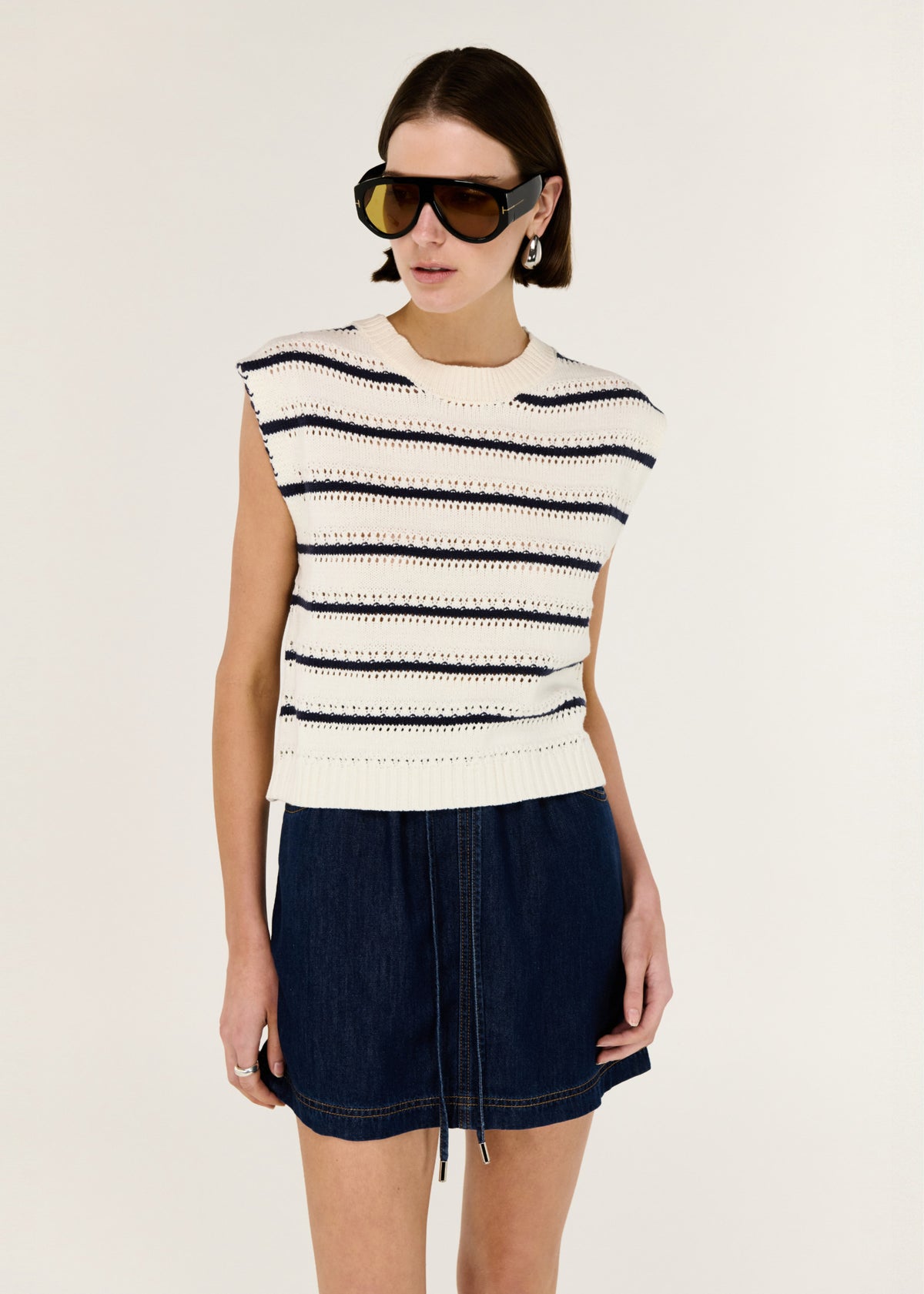 Close-up of the Striped Cotton Blend Knit Tank, showing a sleeveless cut.
