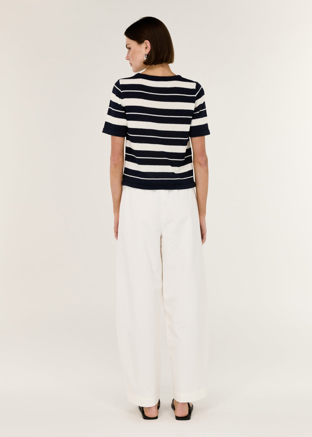 Back view of the Striped Crew Neck Knit Tee with short sleeves and a classic crew neckline.