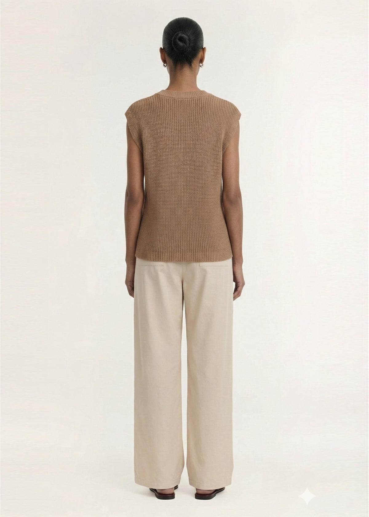 Back view of the Taupe Cotton Blend Knit Tank Top with a textured rib knit fabrication and a sleeveless silhouette.