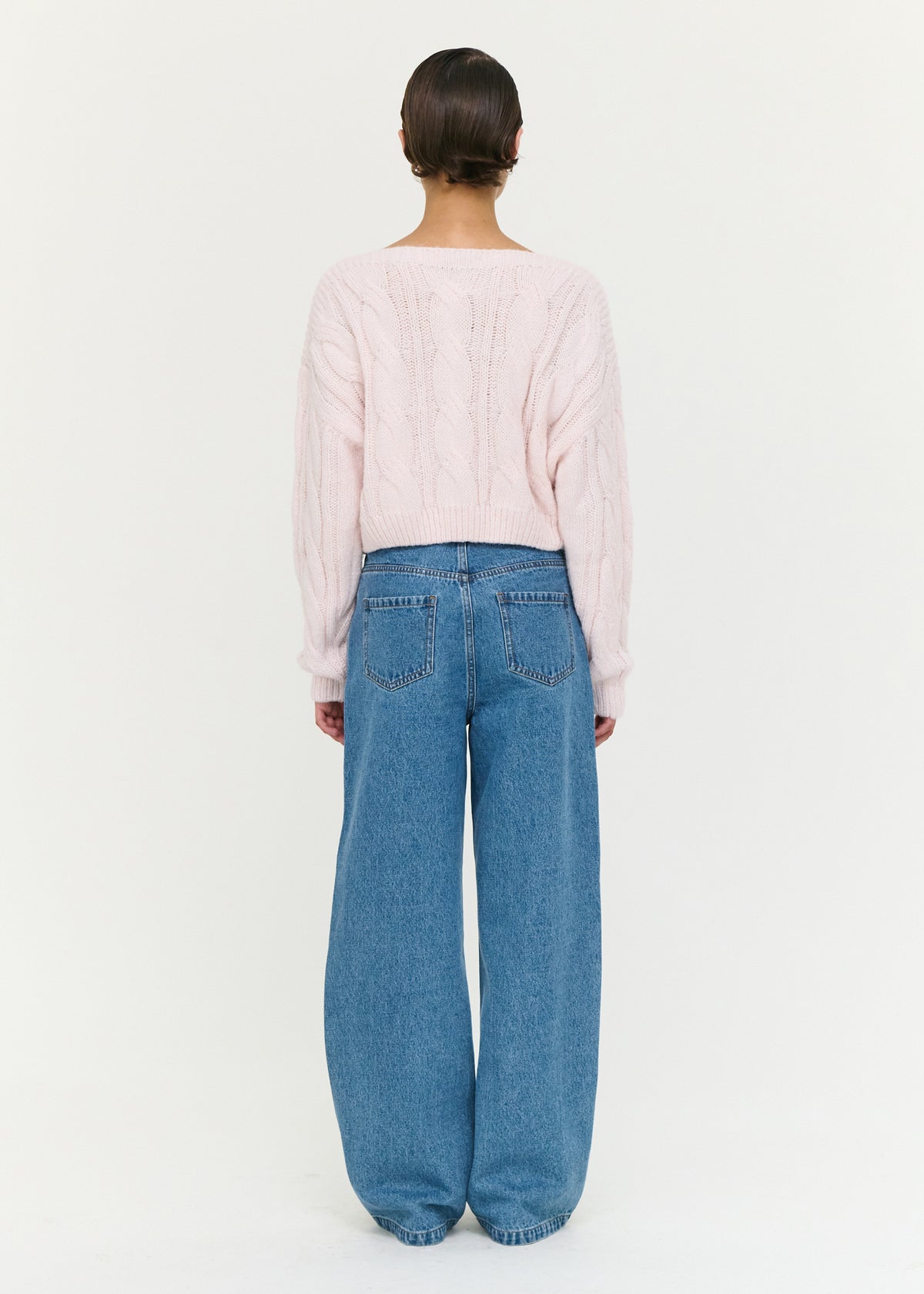 Back view of the Tie Waist Detail Mid Rise Jeans, showing an adjustable waist tie detail.