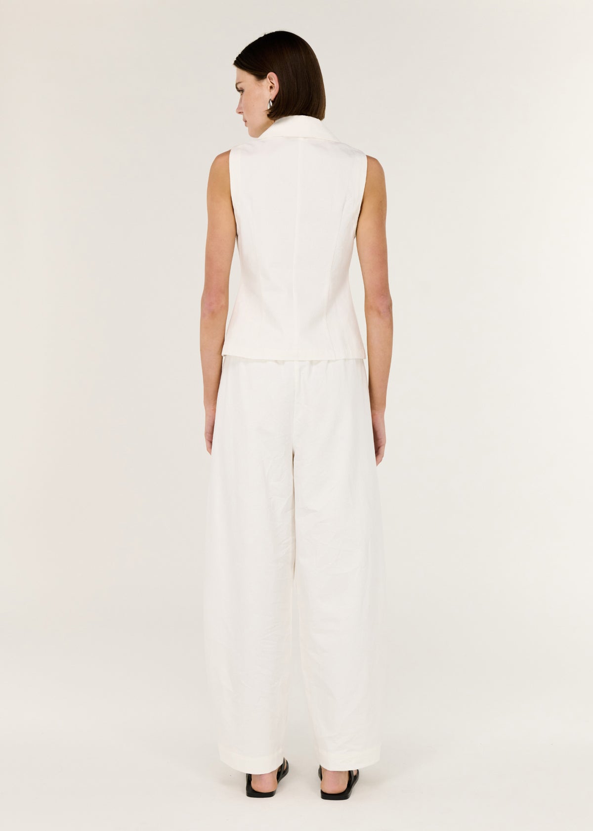 Back view of the White Cotton Relaxed Wide-Leg Pant with a relaxed wide-leg fit and a pull-on waist.