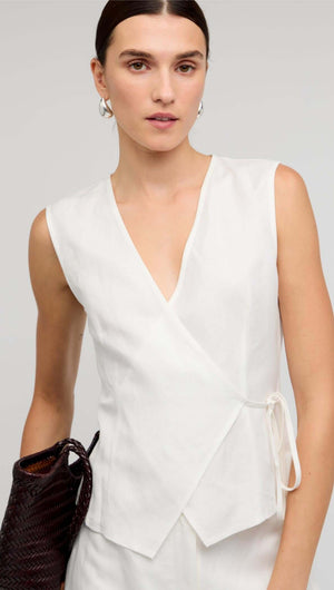 White Sleeveless Linen Wrap Top by Staple the Label featuring a deep V-neckline and adjustable tie waist.