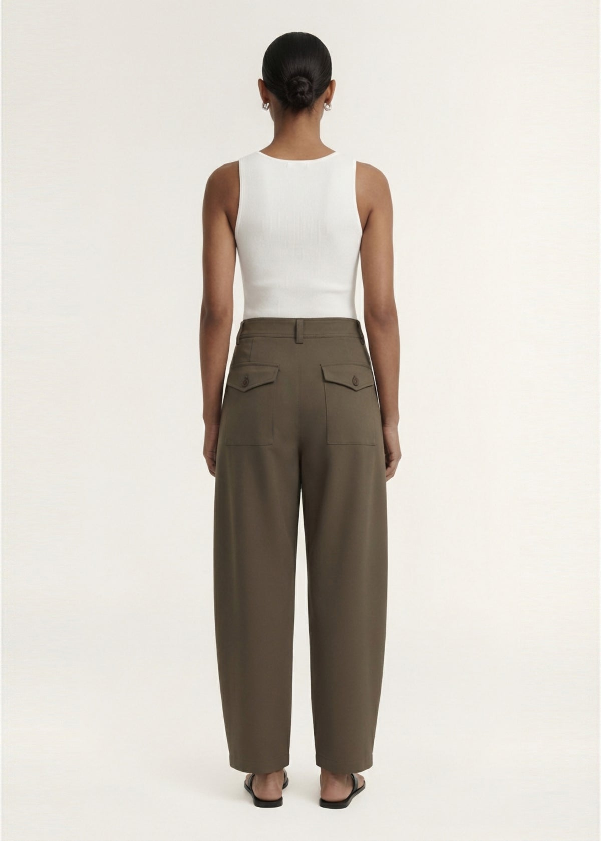 Back view of the White Square Neck Ribbed Knit Tank with wide shoulder straps and a ribbed knit fabrication.