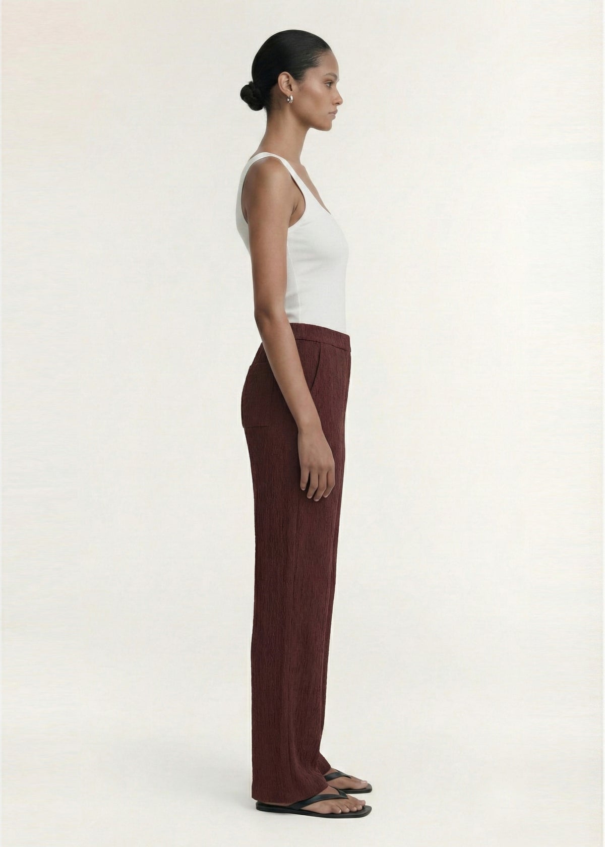 Side profile of the White Square Neck Ribbed Knit Tank with a clean minimal finish and a pull-on style.