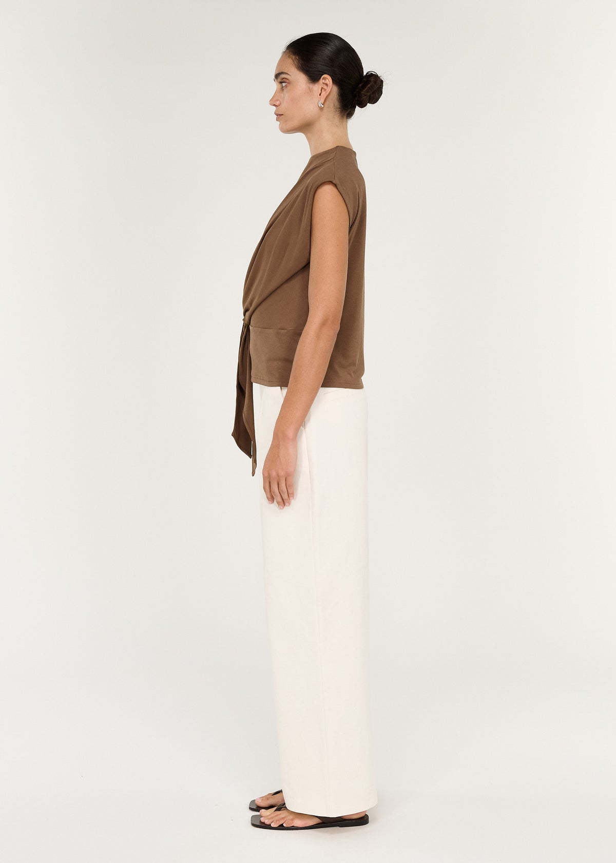 Model wearing a Draped Cotton Jersey Top in Mocha, showcasing a side view with relaxed fit and tie detail.