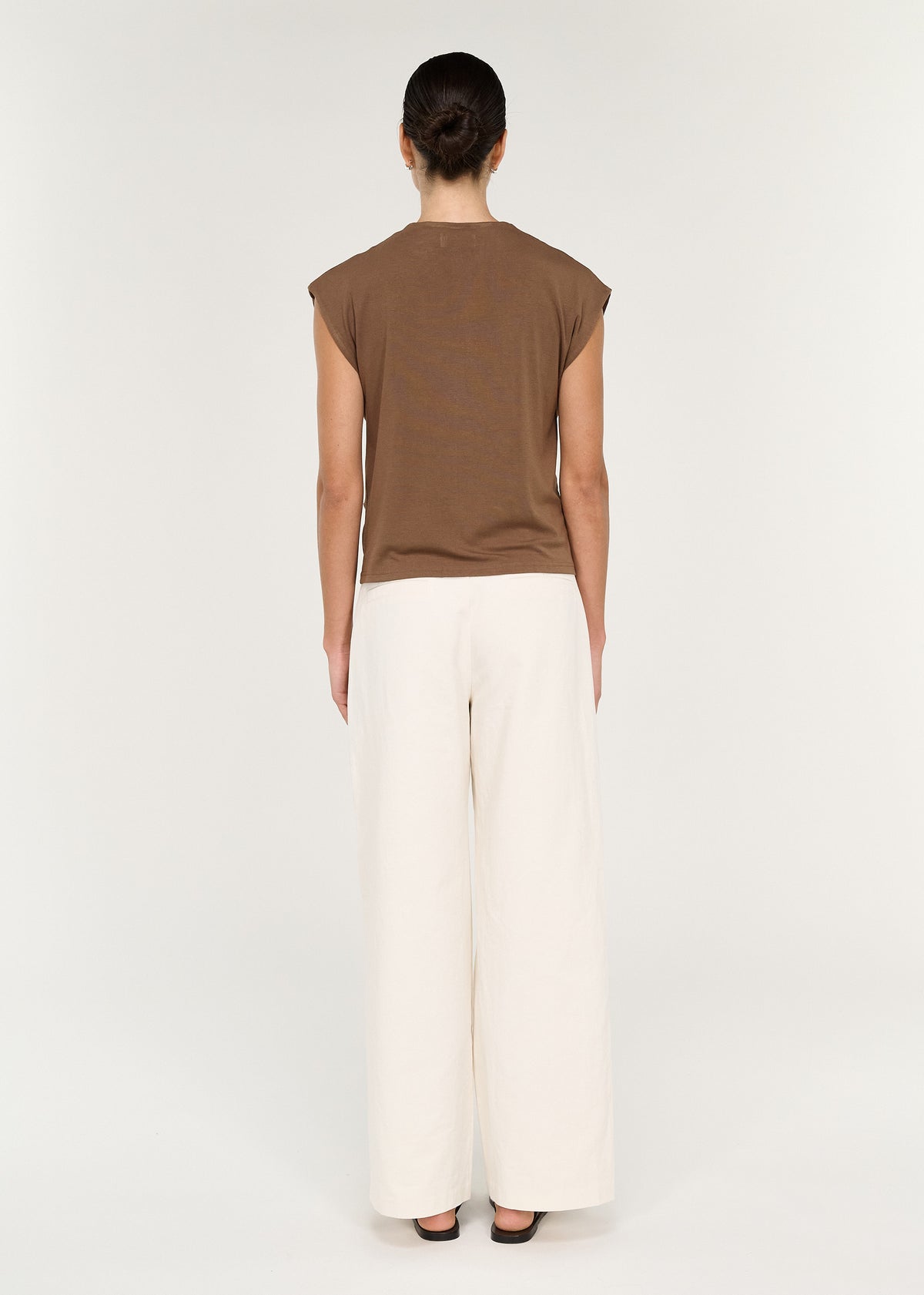 Draped Cotton Jersey Top in Mocha view from the back, paired with white wide-leg trousers.